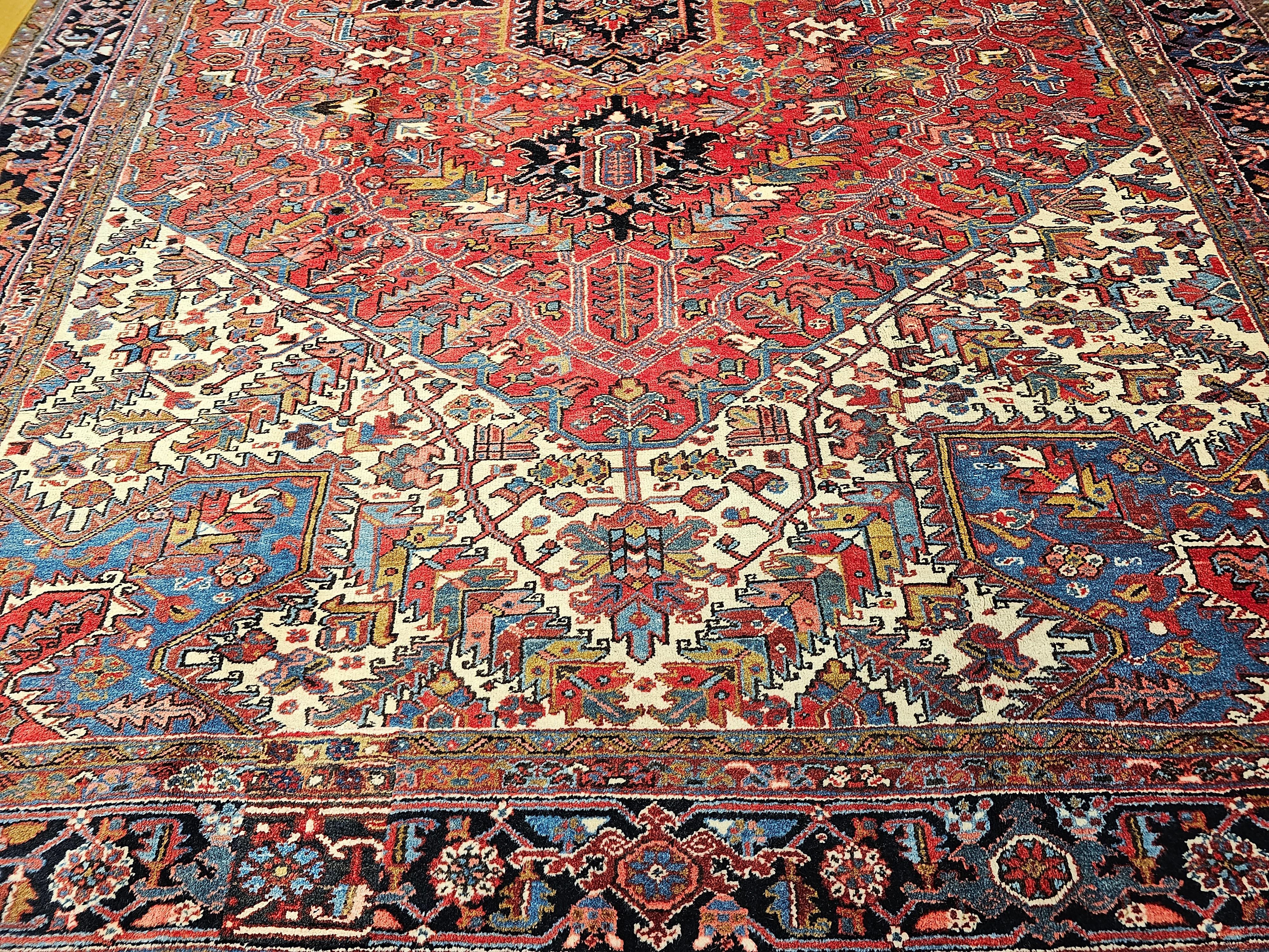 Hand-Knotted Vintage Oversize Persian Heriz Rug in Red, Navy, Ivory, Green, Blue, Brown For Sale