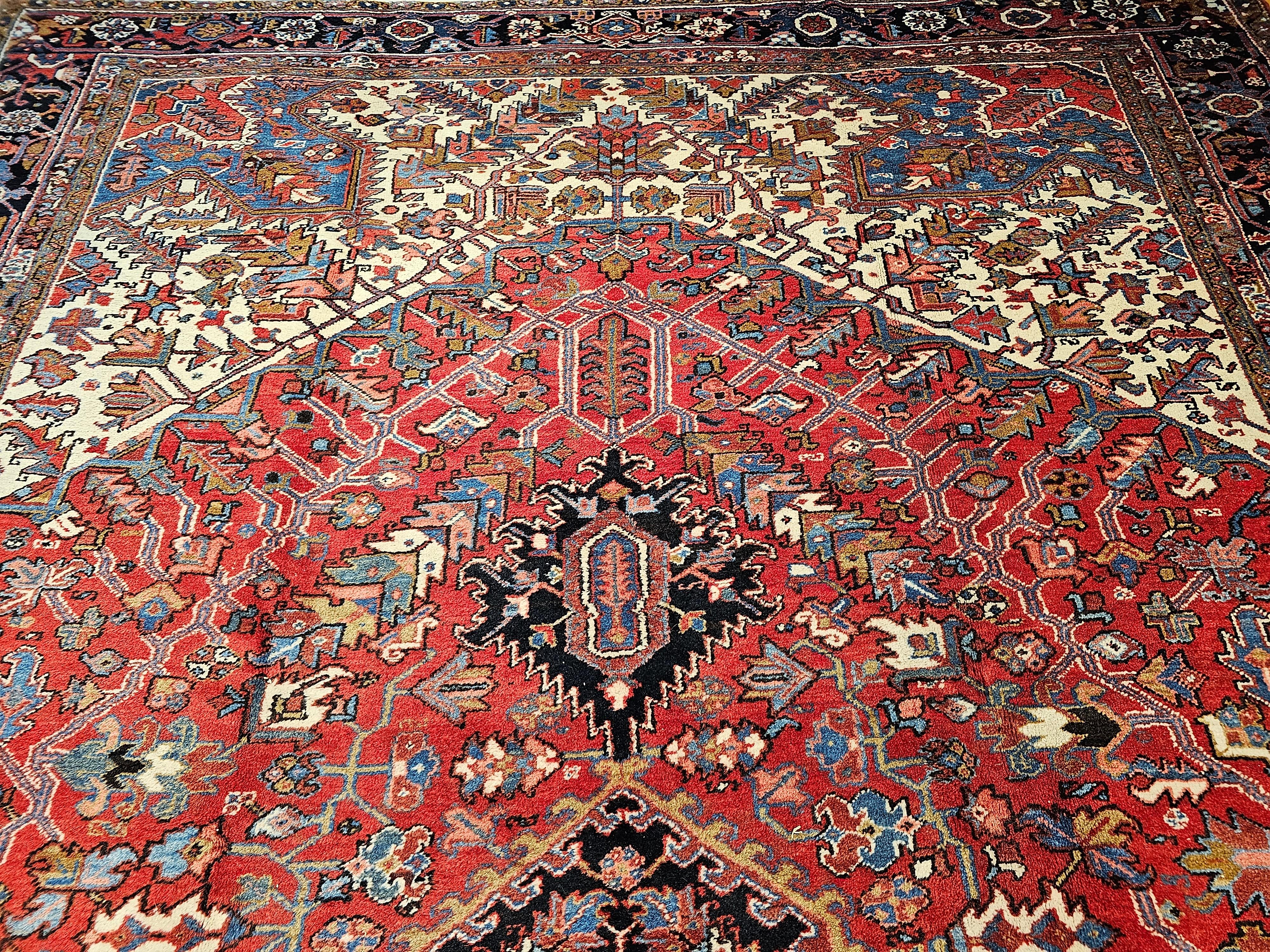 20th Century Vintage Oversize Persian Heriz Rug in Red, Navy, Ivory, Green, Blue, Brown For Sale