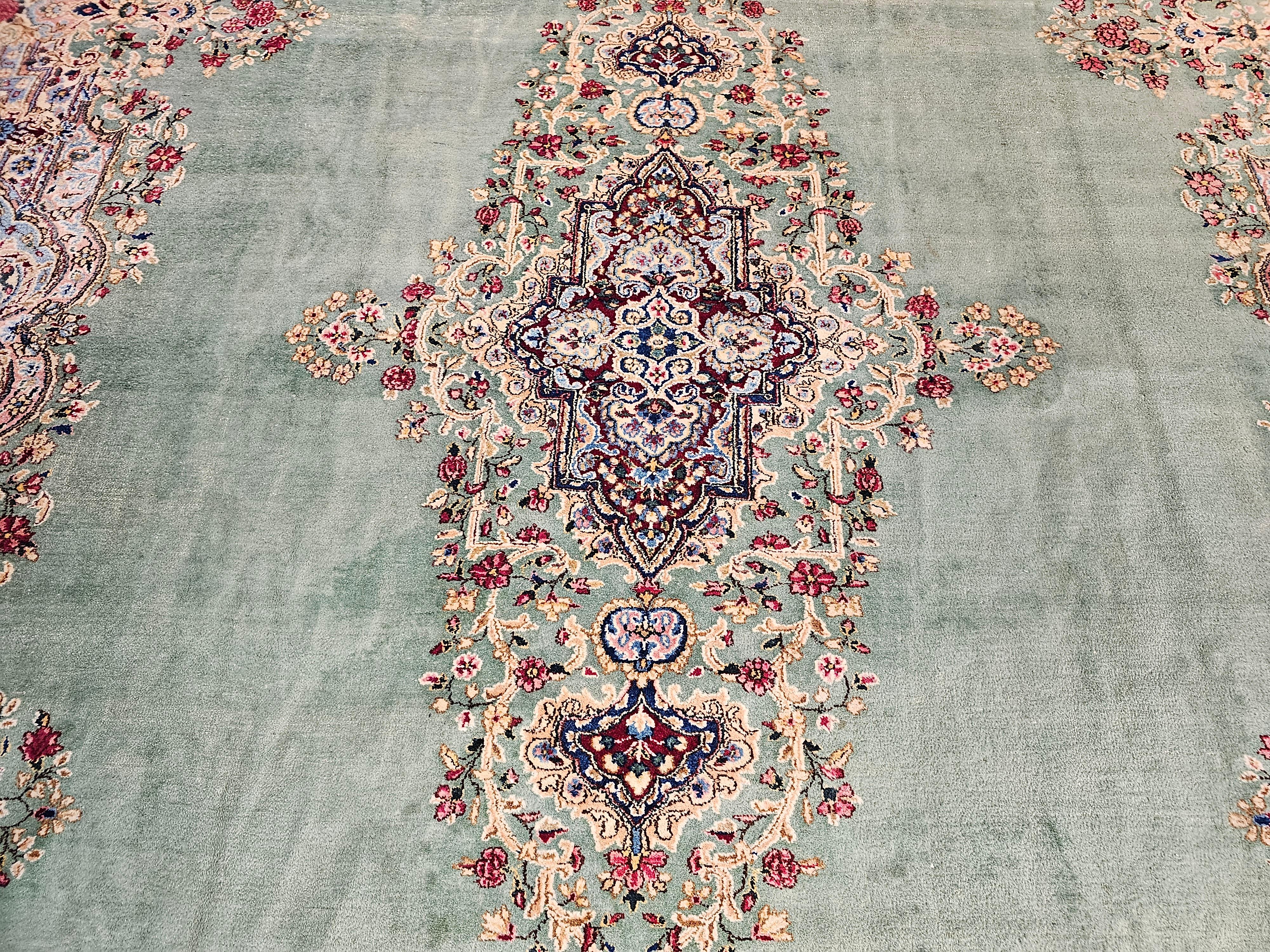 Wool Vintage Oversize Persian Kerman in Floral Pattern in Pale Green, Red, Blue, Pink For Sale
