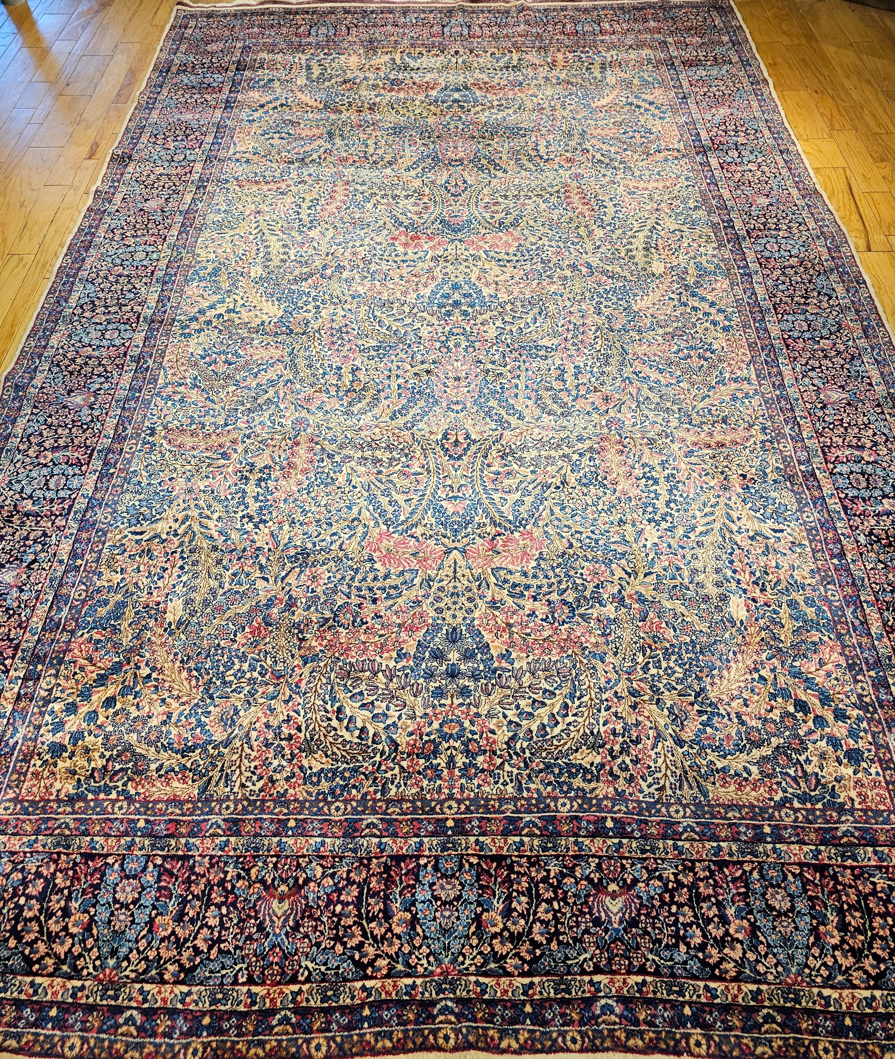 A majestic Kerman Lavar rug from the renowned village of Lavar in Southwest Persian.   The Kerman Lavar rug was handwoven in one of the finest workshops during the first quarter of the 1900s.  It has a beautiful 