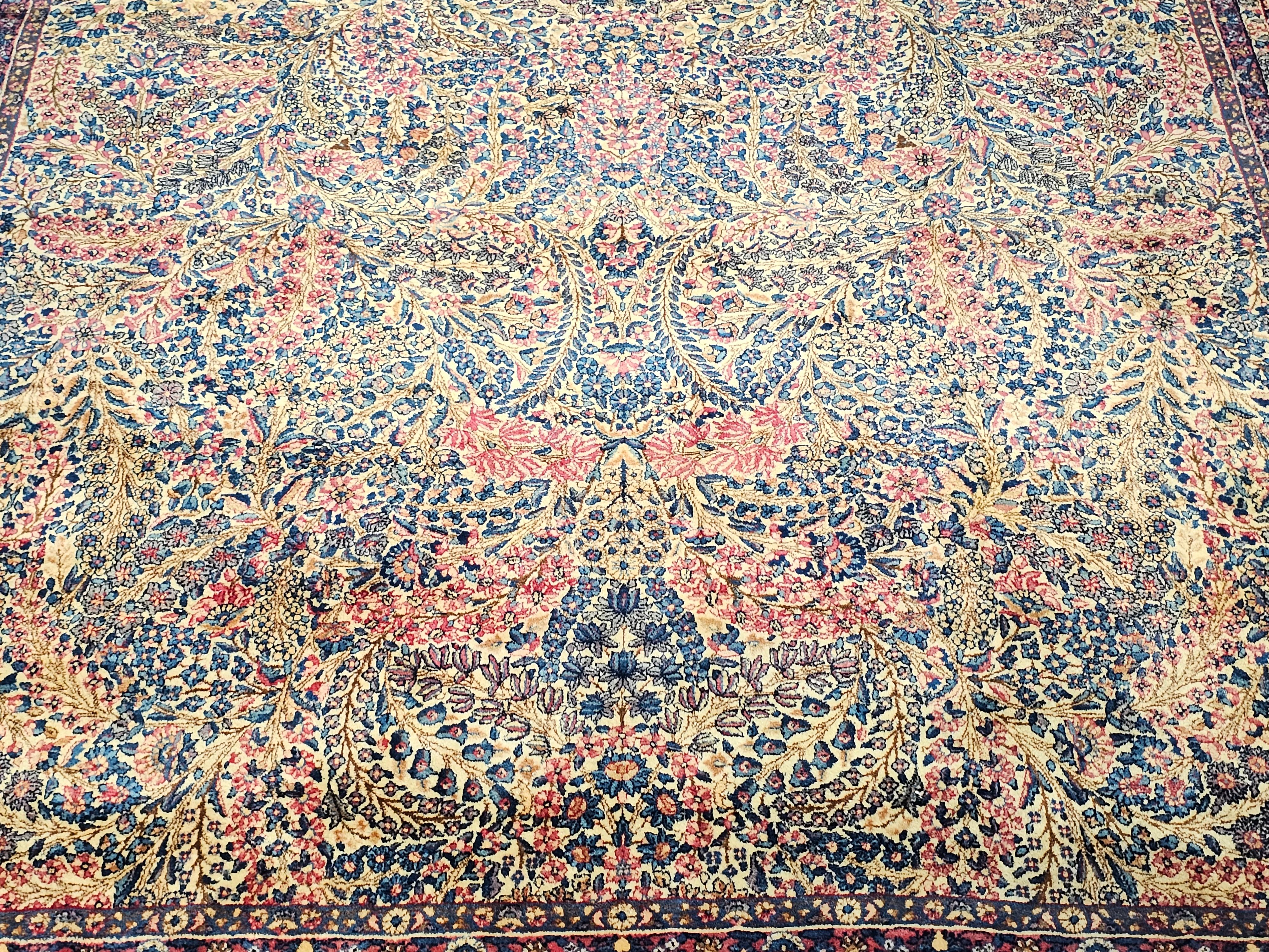 Vintage Oversize Persian Kerman Lavar in Floral Design in Ivory, Navy, Red, Blue In Good Condition For Sale In Barrington, IL