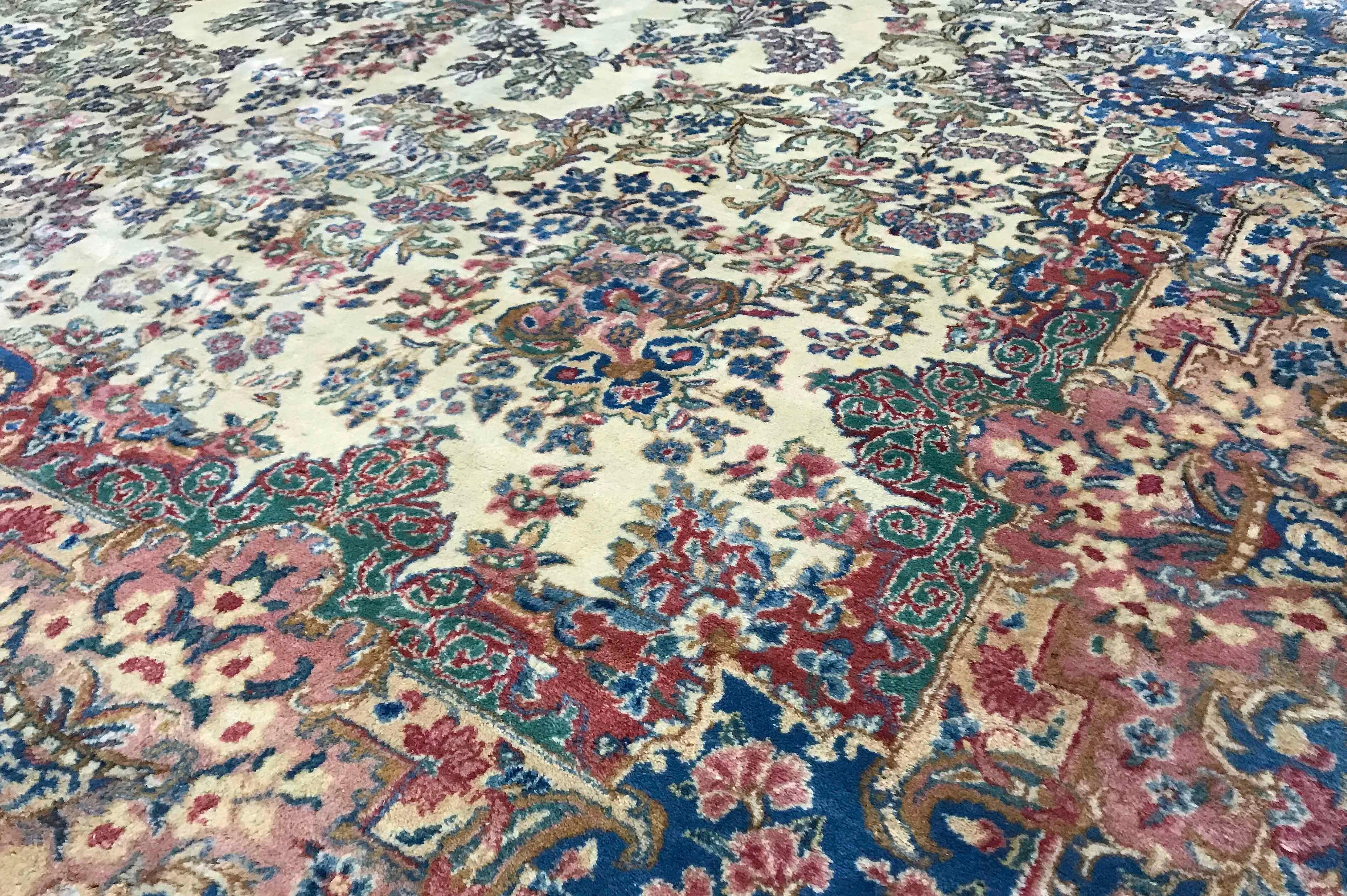 Vintage oversize Persian Kerman rug, circa 1940. This beautiful 1940s Kerman has all the elements that make rugs from this area of Persia so popular. The color combinations combined with the amazing intricate detail creates a true masterpiece of the