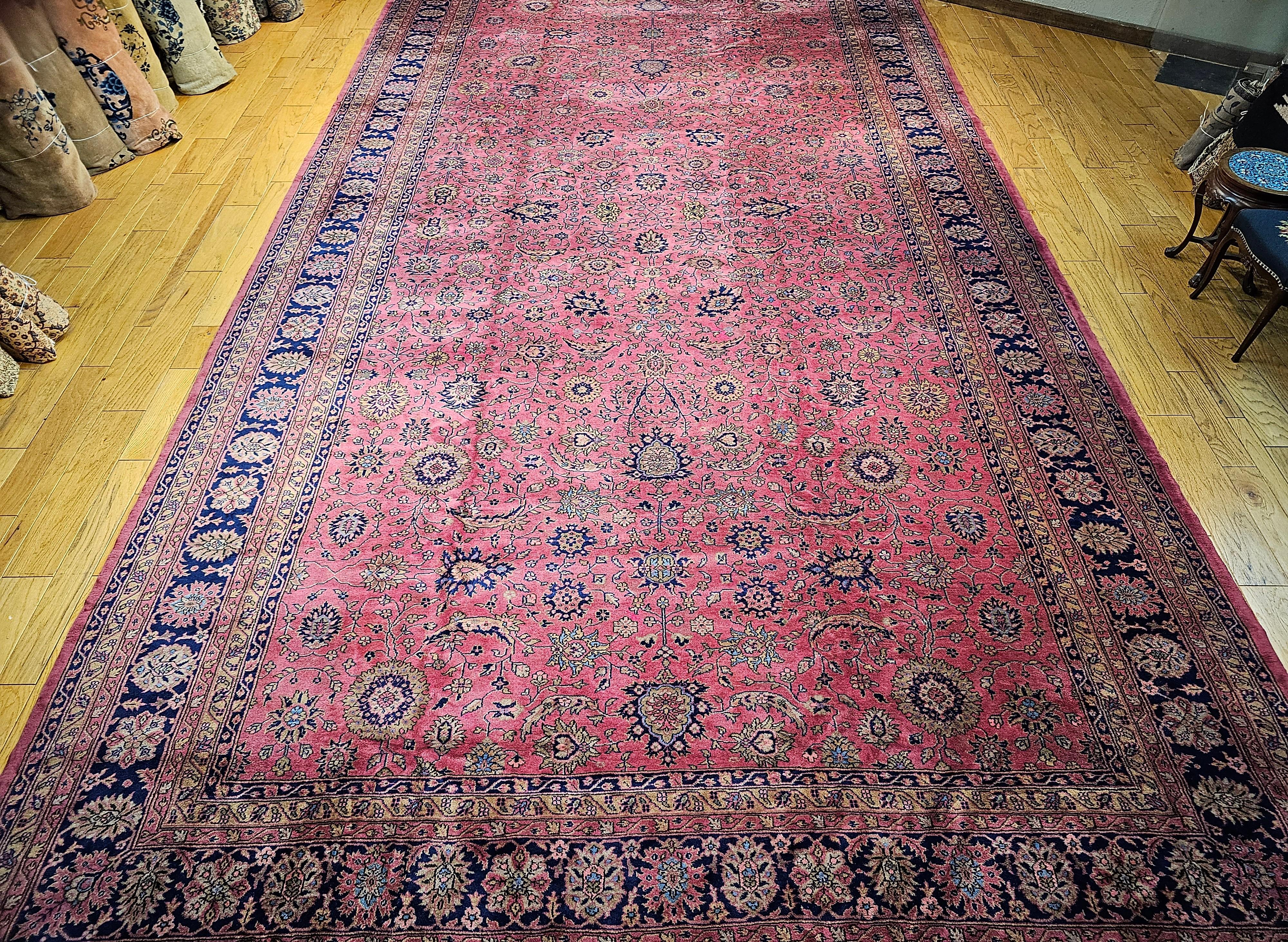 Vintage oversized Turkish rug in an all over large geometric pattern that resembles very closely with the designs of the vintage Persian Tabriz. Mahal Sultanabad, Manchester Kashan or Kerman carpets from the late 19th century. The rug has a