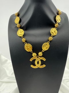 Vintage Oversized Gold Textured CC "CHANEL" Horse Coin Station Necklace