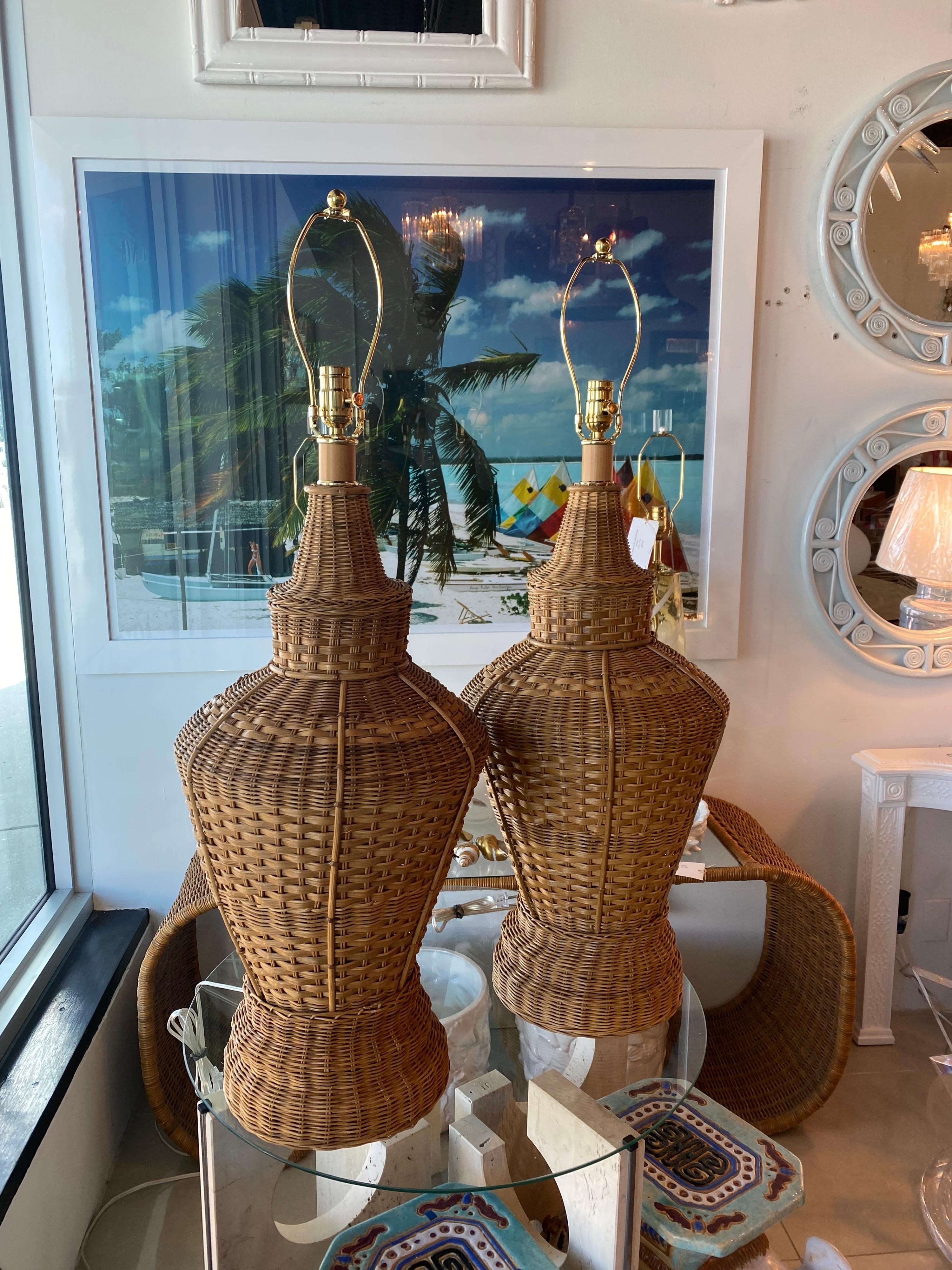 The most amazing pair of oversized wicker pagoda table lamps. These have been newly wired with all new 3 way brass sockets. The size of the lamps are 38