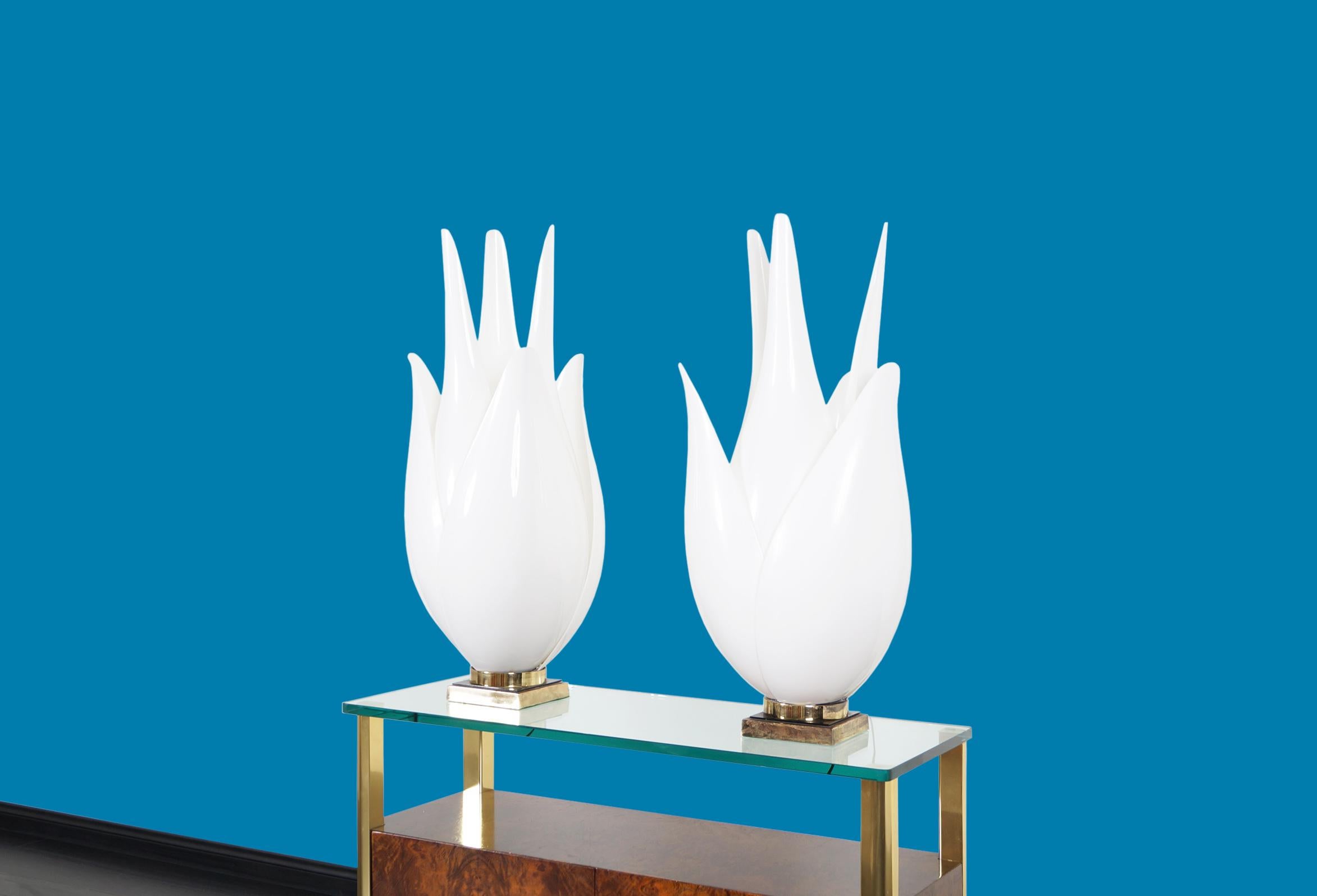 Spectacular vintage oversized “Tulip” lamps designed and manufactured by Roger Rougier in Canada, circa 1970s. These lamps have an elegant design where their fine curves stand out through their structure. The tulips represented in each lamp are