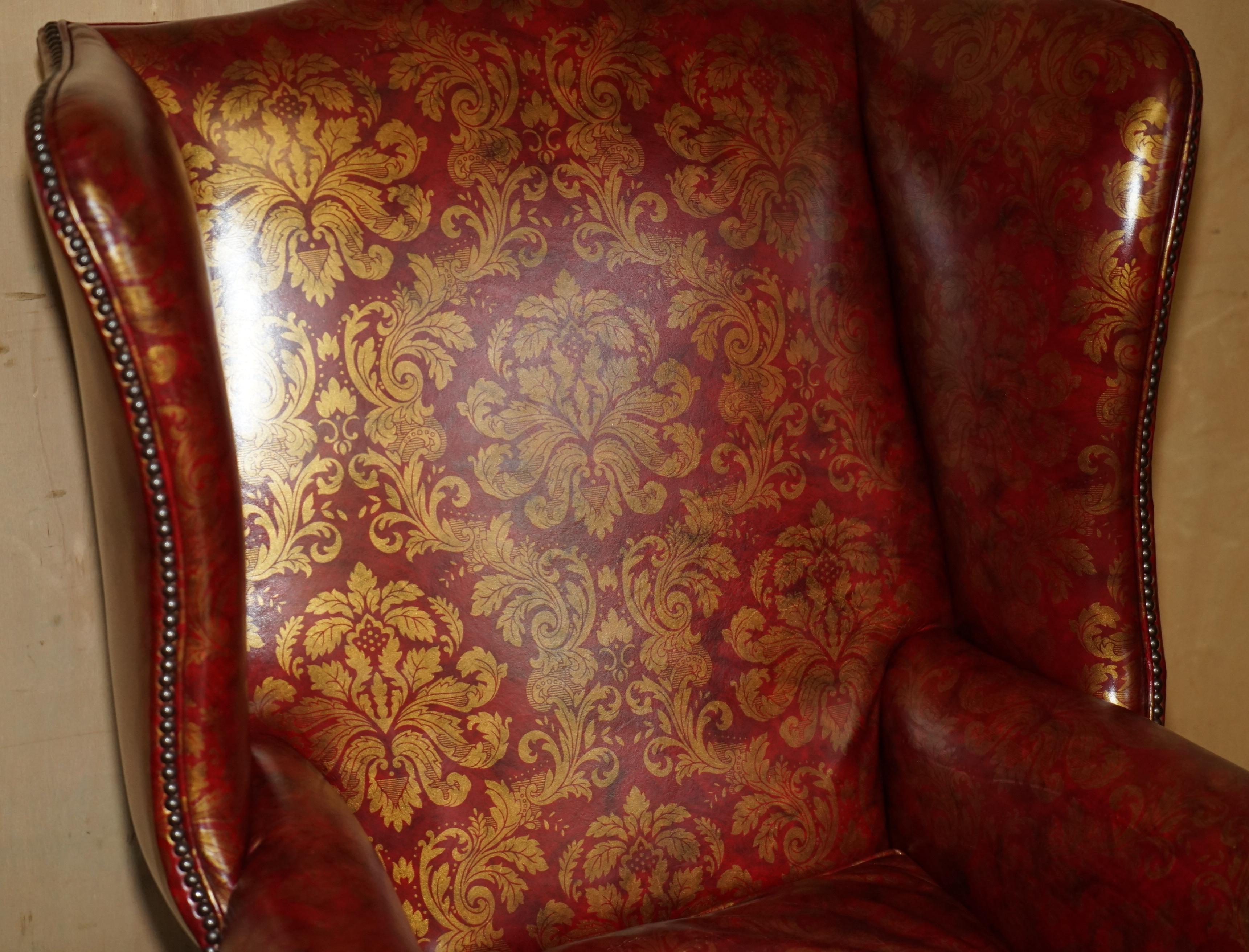 VINTAGE OXBLOOD CLAW & BALL FEET DAMASK LEATHER WiNGBACK ARMCHAIR & FOOTSTOOL (Handgefertigt) im Angebot