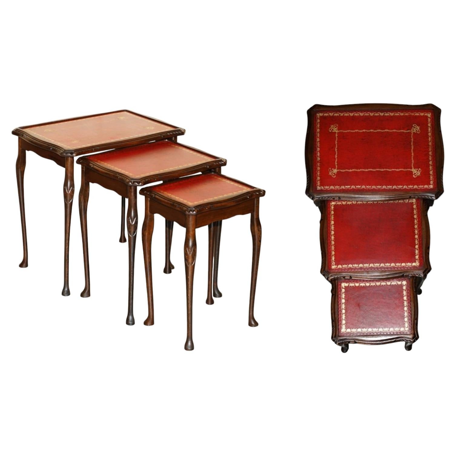 VINTAGE OXBLOOD GOLD LEAF, LEATHER & BEECH MID CENTURY NEST OF THREE TABLEs
