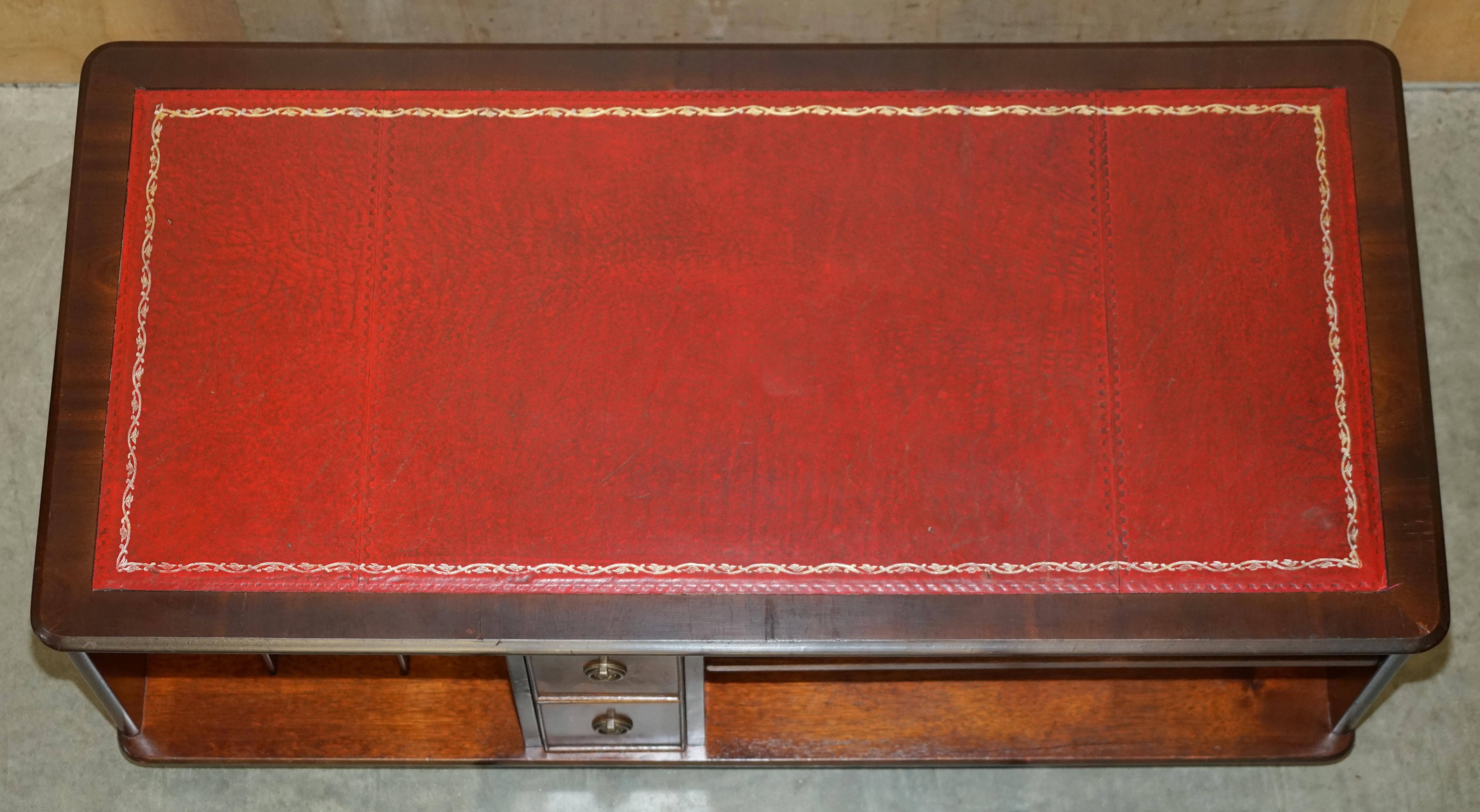 ViNTAGE OXBLOOD LEATHER AND FLAMED HARDWOOD COFFEE TABLE PART OF LARGE SUITE For Sale 1