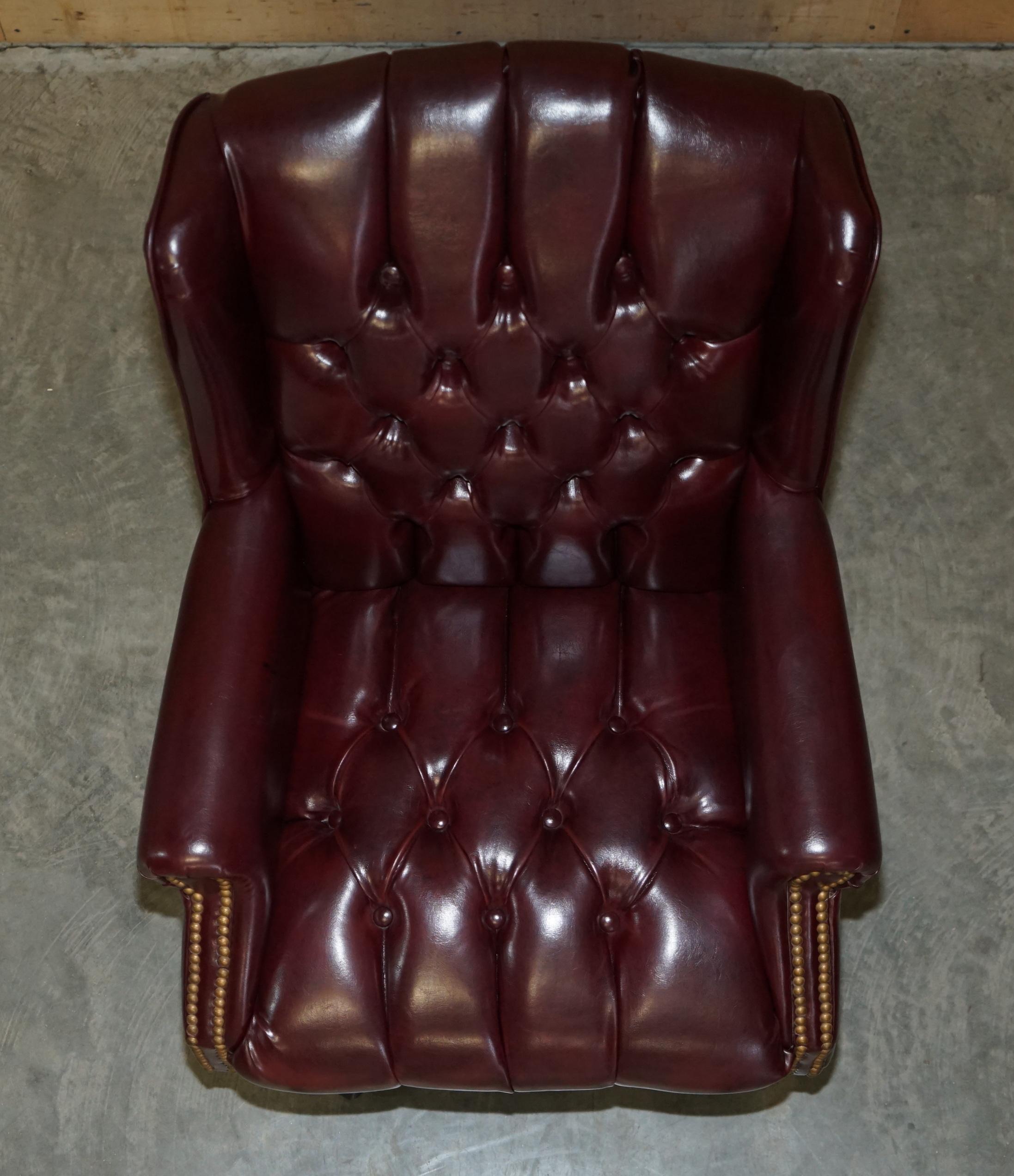 Vintage Oxblood Leather Antique Stud Chesterfield Wingback Swivel Office Chair For Sale 3