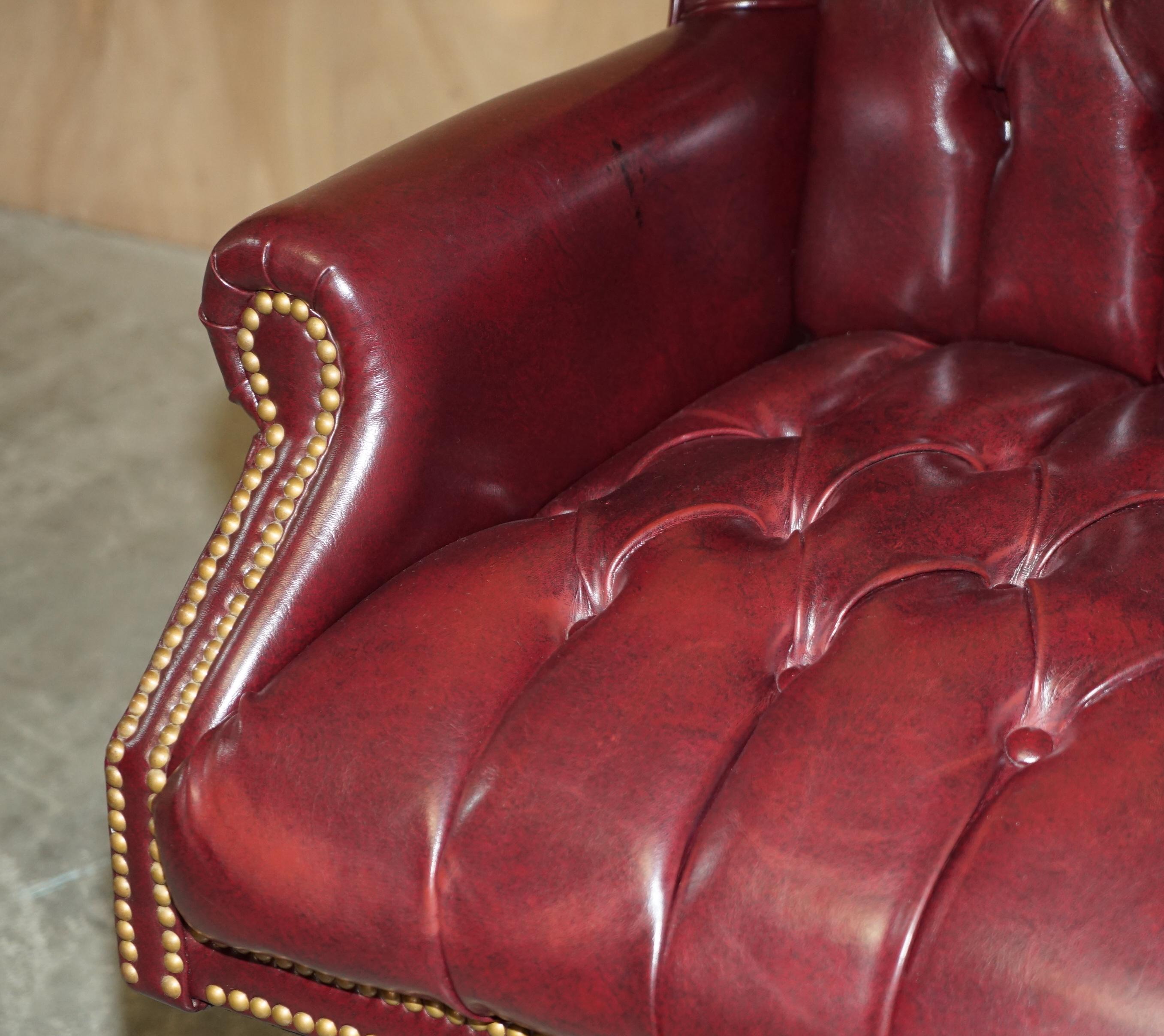 Vintage Oxblood Leather Antique Stud Chesterfield Wingback Swivel Office Chair For Sale 5