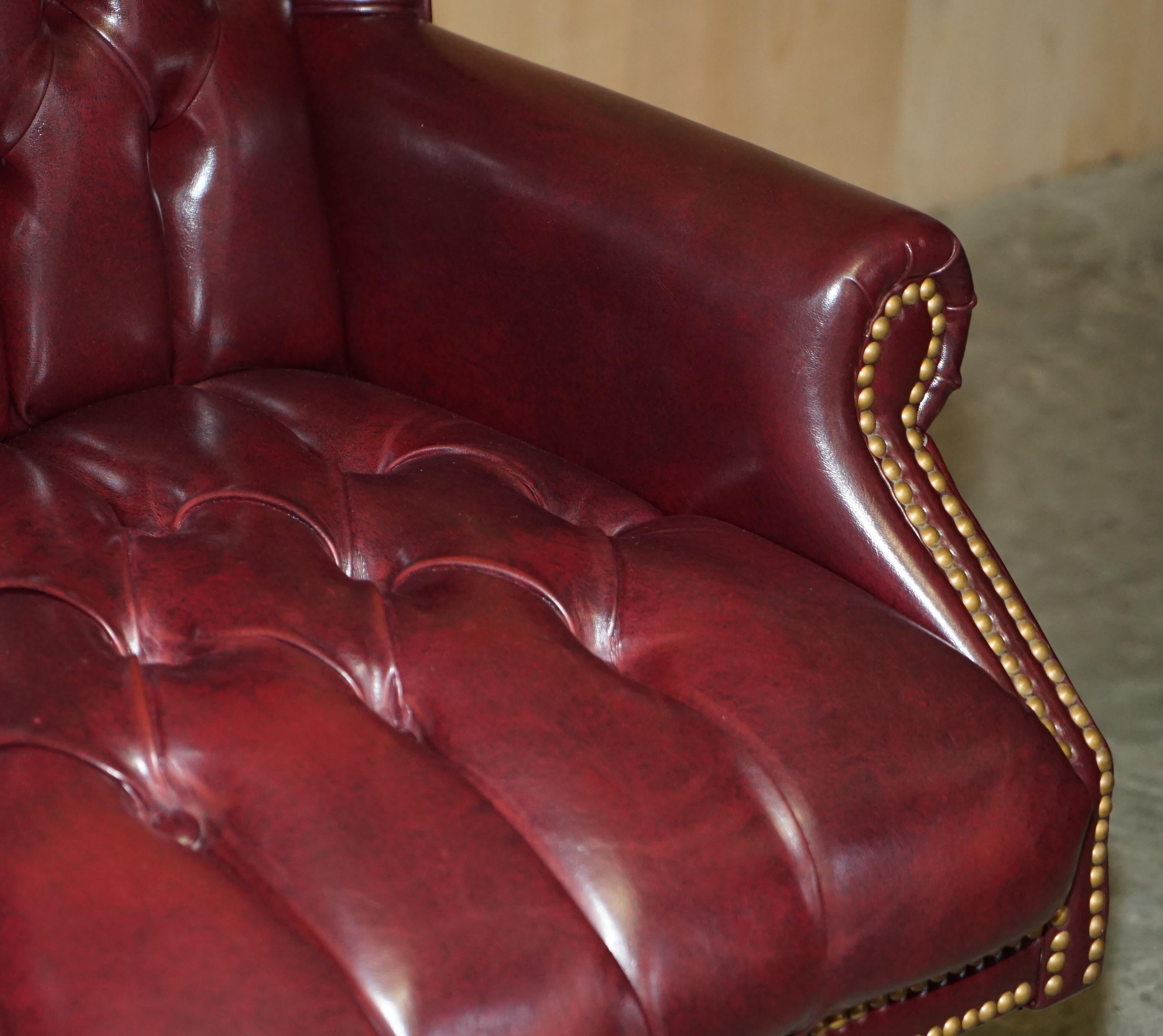 Vintage Oxblood Leather Antique Stud Chesterfield Wingback Swivel Office Chair For Sale 6