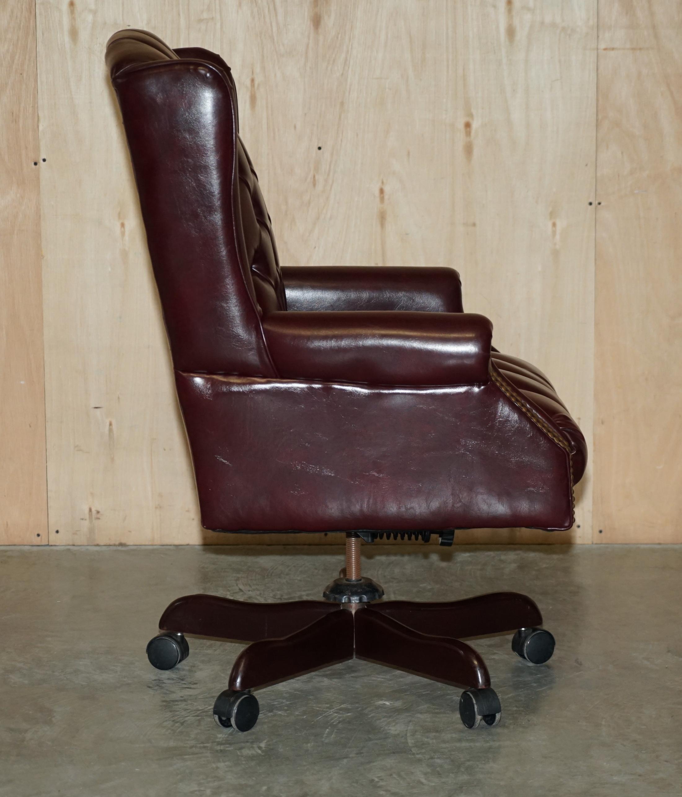 Vintage Oxblood Leather Antique Stud Chesterfield Wingback Swivel Office Chair For Sale 7