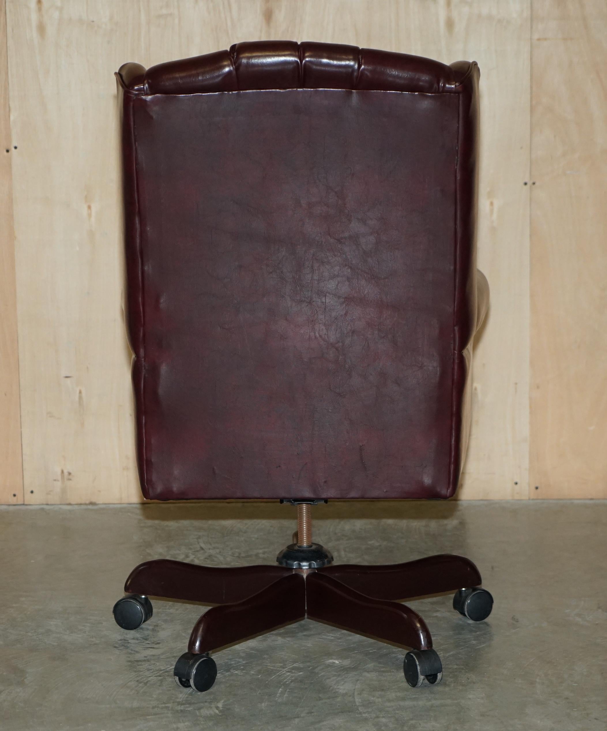 Vintage Oxblood Leather Antique Stud Chesterfield Wingback Swivel Office Chair For Sale 8
