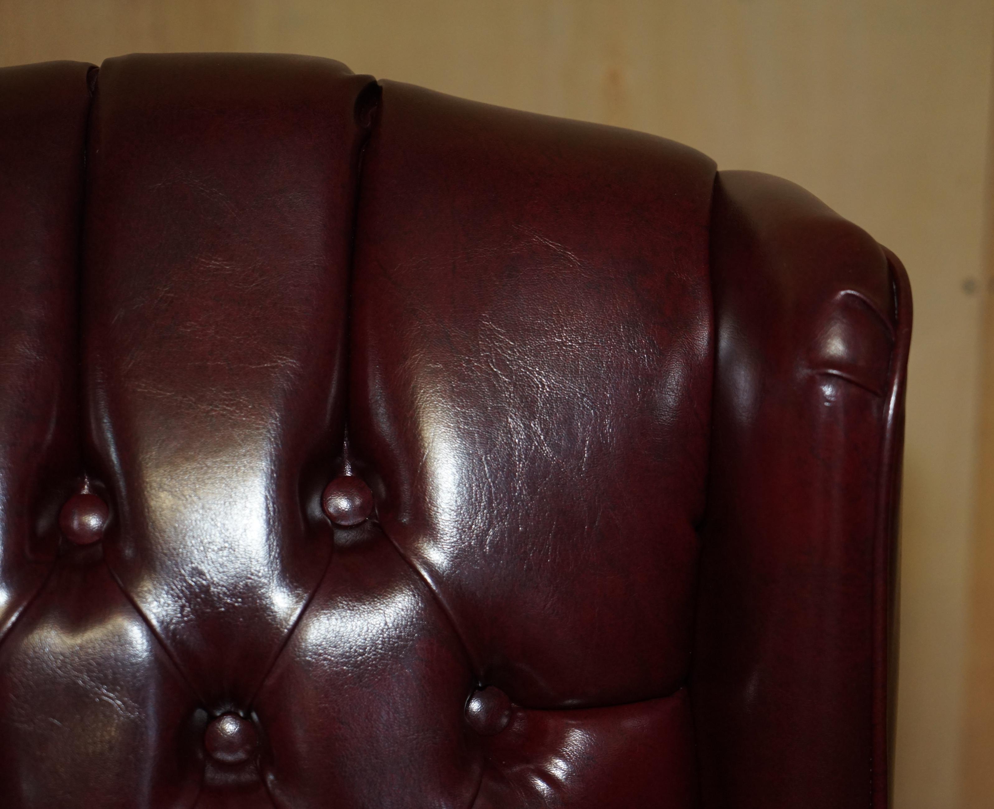 English Vintage Oxblood Leather Antique Stud Chesterfield Wingback Swivel Office Chair For Sale