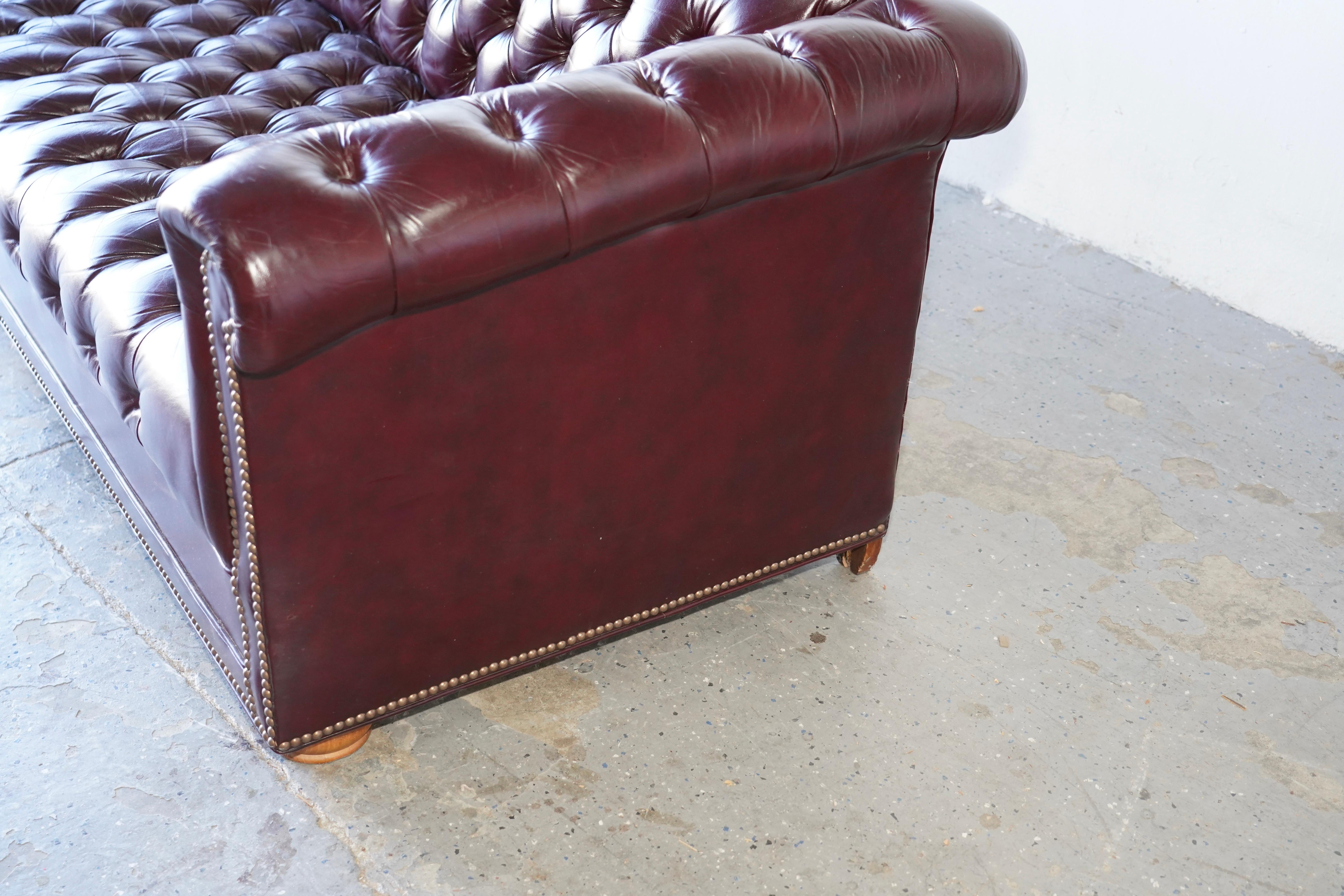 Vintage Oxblood Leather Tufted Chesterfield Sofa In Good Condition For Sale In Las Vegas, NV
