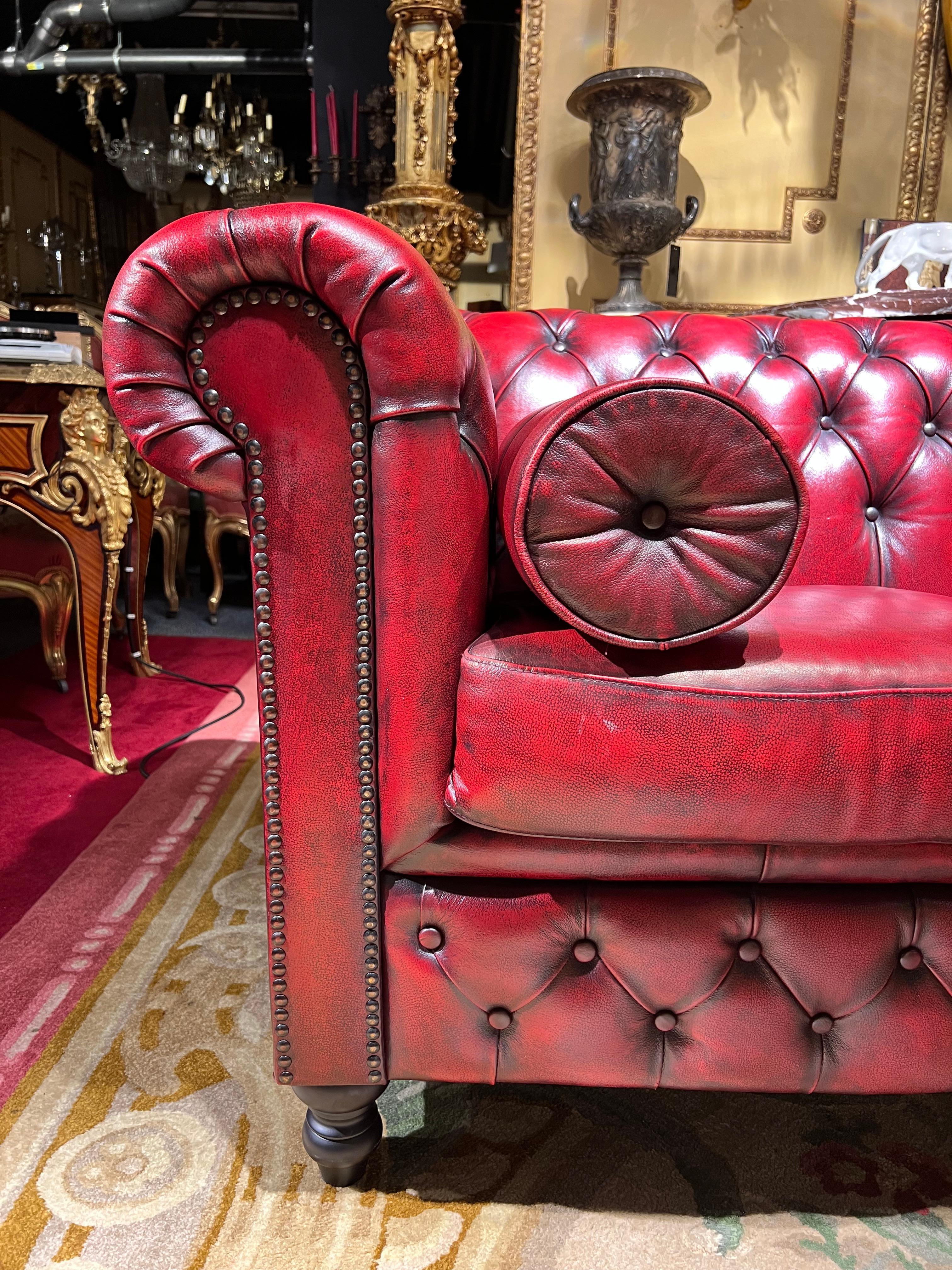 oxblood chesterfield couch