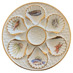 Assiette à huîtres vintage avec créatures marines doublée d'or
