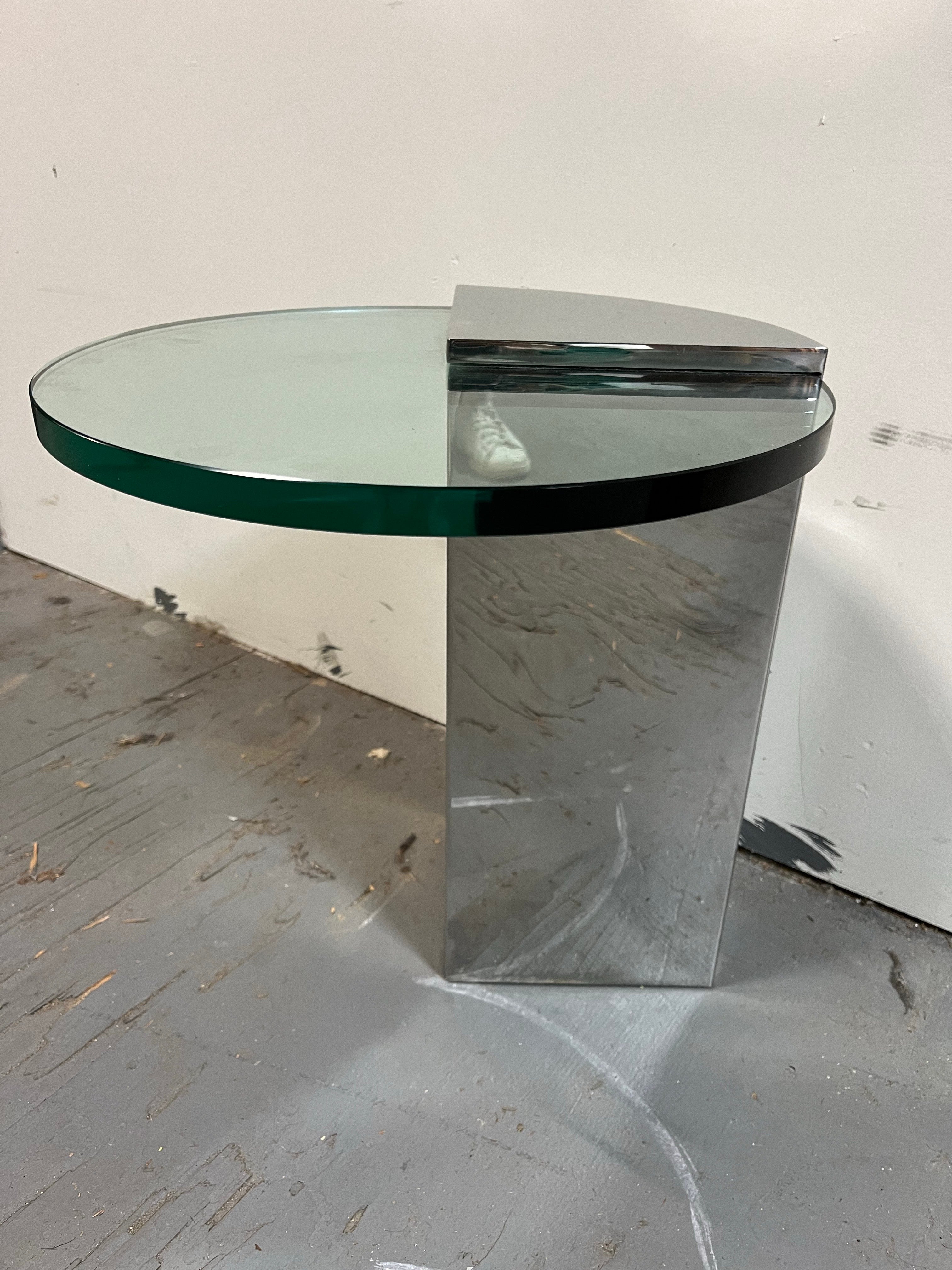 Unique side table in the Pac Man style of the Pace Collection. Wedge shaped base with cantilevered glass top. 3/4