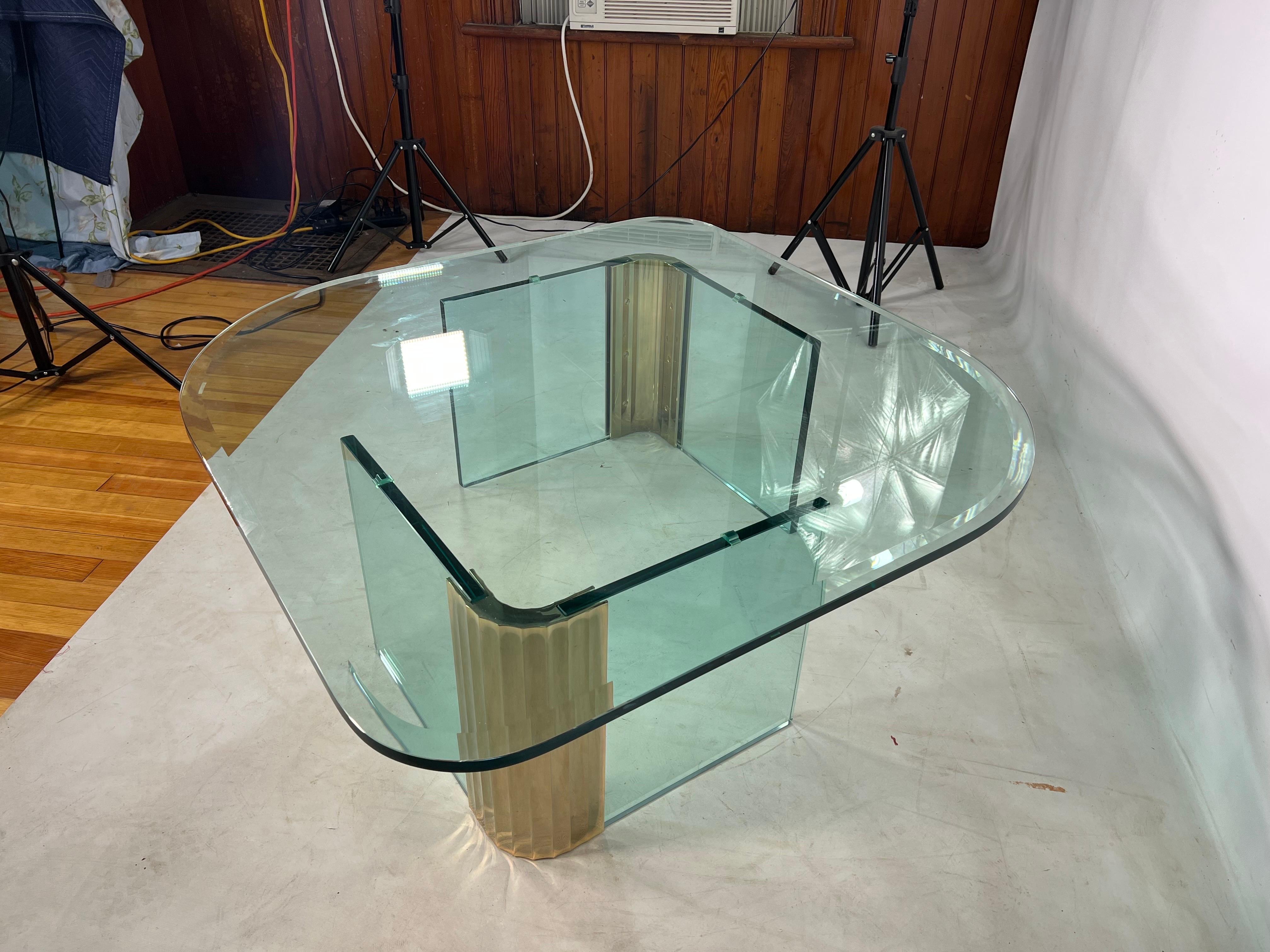 Vintage Pace Collection waterfall scalloped brass and glass coffee table by Leon Rosen. This is a gorgeous coffee table that is in very good shape.