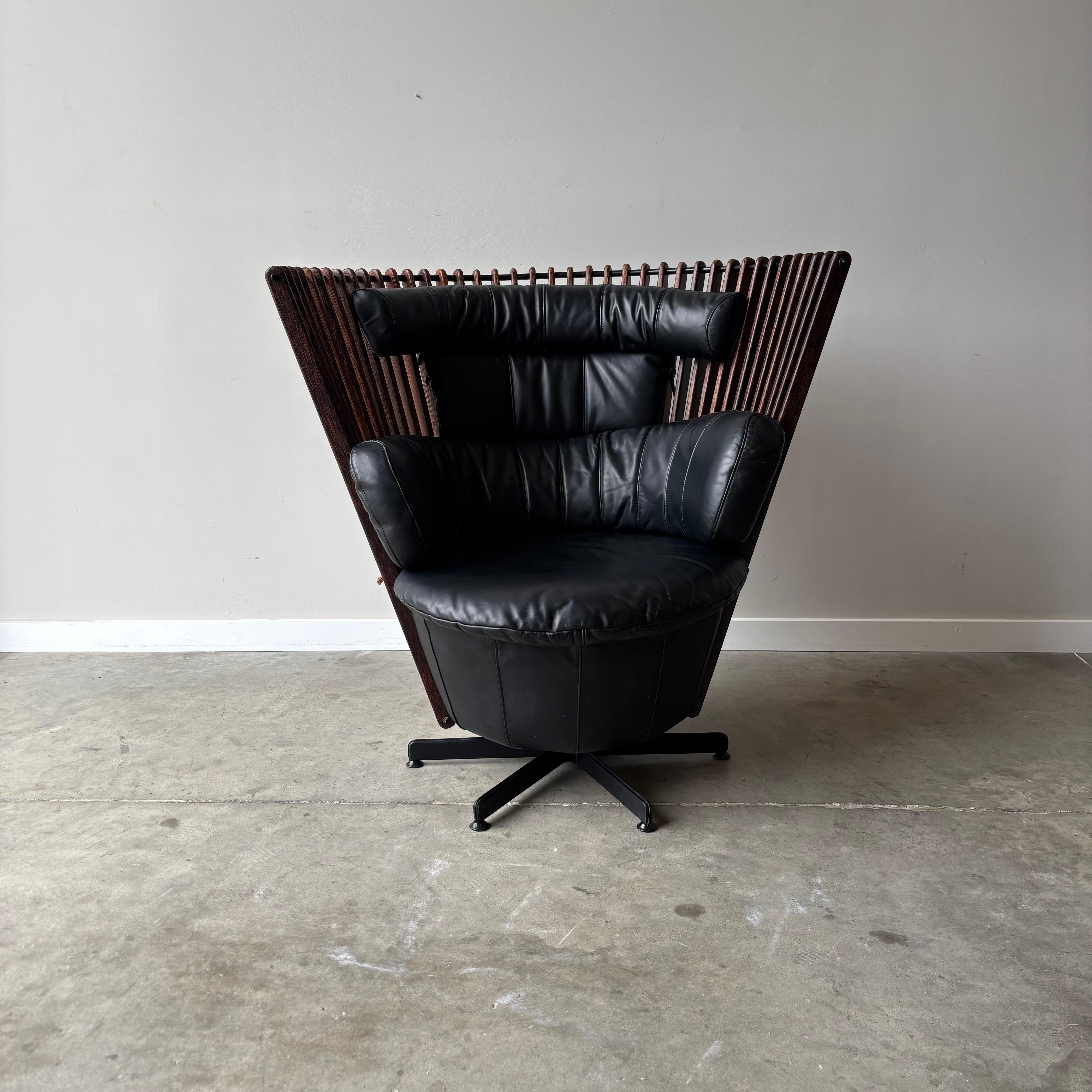 This captivating lounge chair merges artistic vision with luxurious comfort, creating a piece that's as beautiful to behold as it is inviting to experience. Drawing inspiration from the elegant vertical structures found in traditional South Pacific