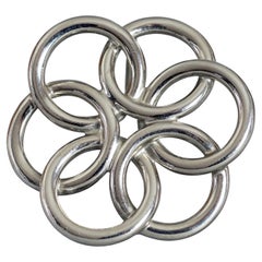 Broche vintage PACO RABANNE multi-cercles d'argent