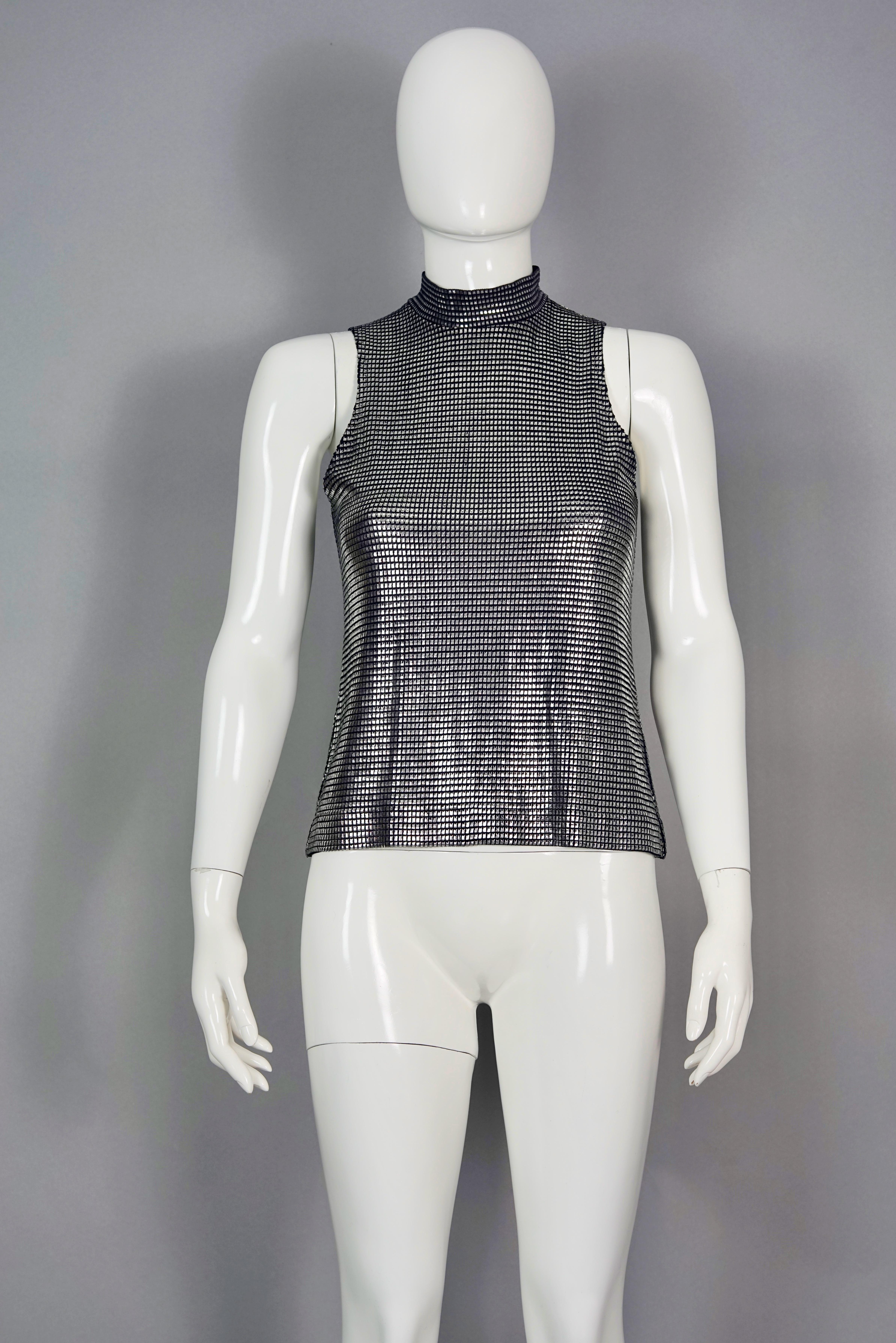Vintage PACO RABANNE Silver Foil Mesh Sleeveless Top Blouse

Measurements taken laid flat, please double bust and waist:
Shoulder: 10.23 inches (26 cm)
Bust: 16.14 inches (41 cm) without stretching
Waist: 16.14 inches (41 cm) without