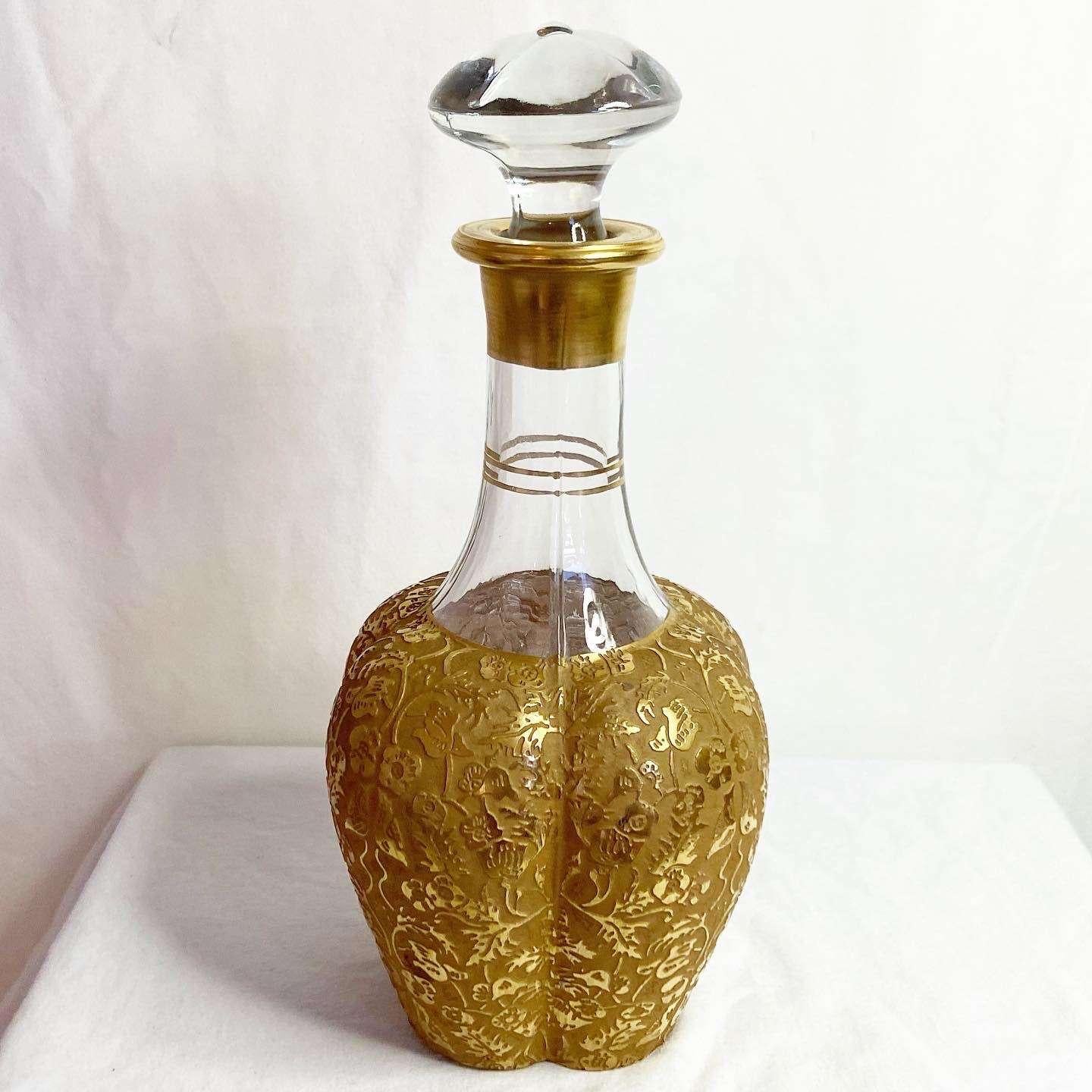 Elegant vintage decanter with gold overlay. The intricate etch is composed of daisies and swallows. This is Paden City's line #211 - Spire.