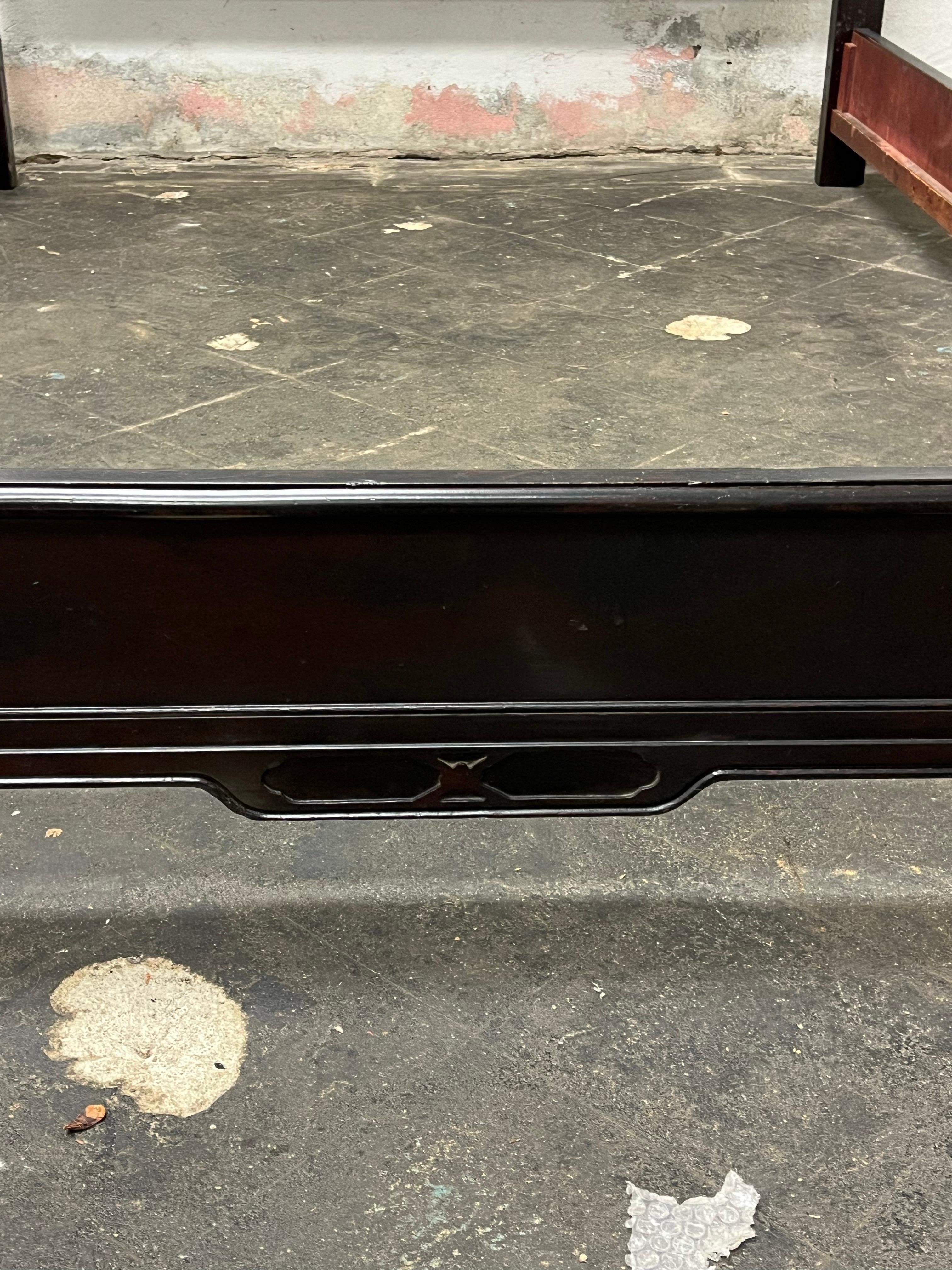 Wonderful Pagoda bed. Wing Furniture Company out of New York City, 1940's.  Queen size. Great Chinoiserie detailing on both headboard and footboard. Mahogany. 
Curbside to NYC/Philly $450