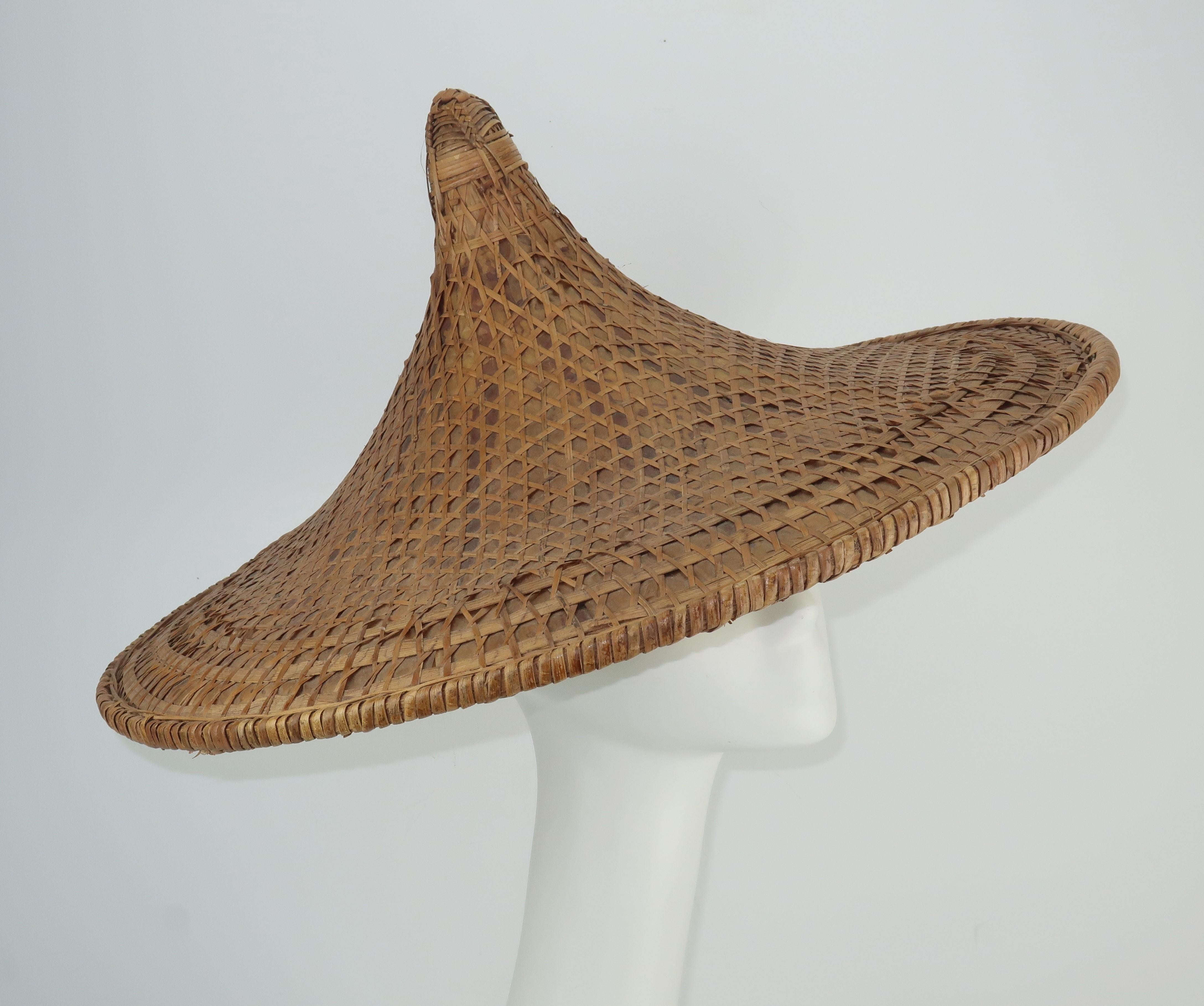 Pagoda perfect!  This functional straw hat will provide plenty of sun shade with a wide brimmed pagoda silhouette.  The unique inner brim headrest helps to keep it in place along with an optional elasticized chin strap.  Fun for gardening, poolside
