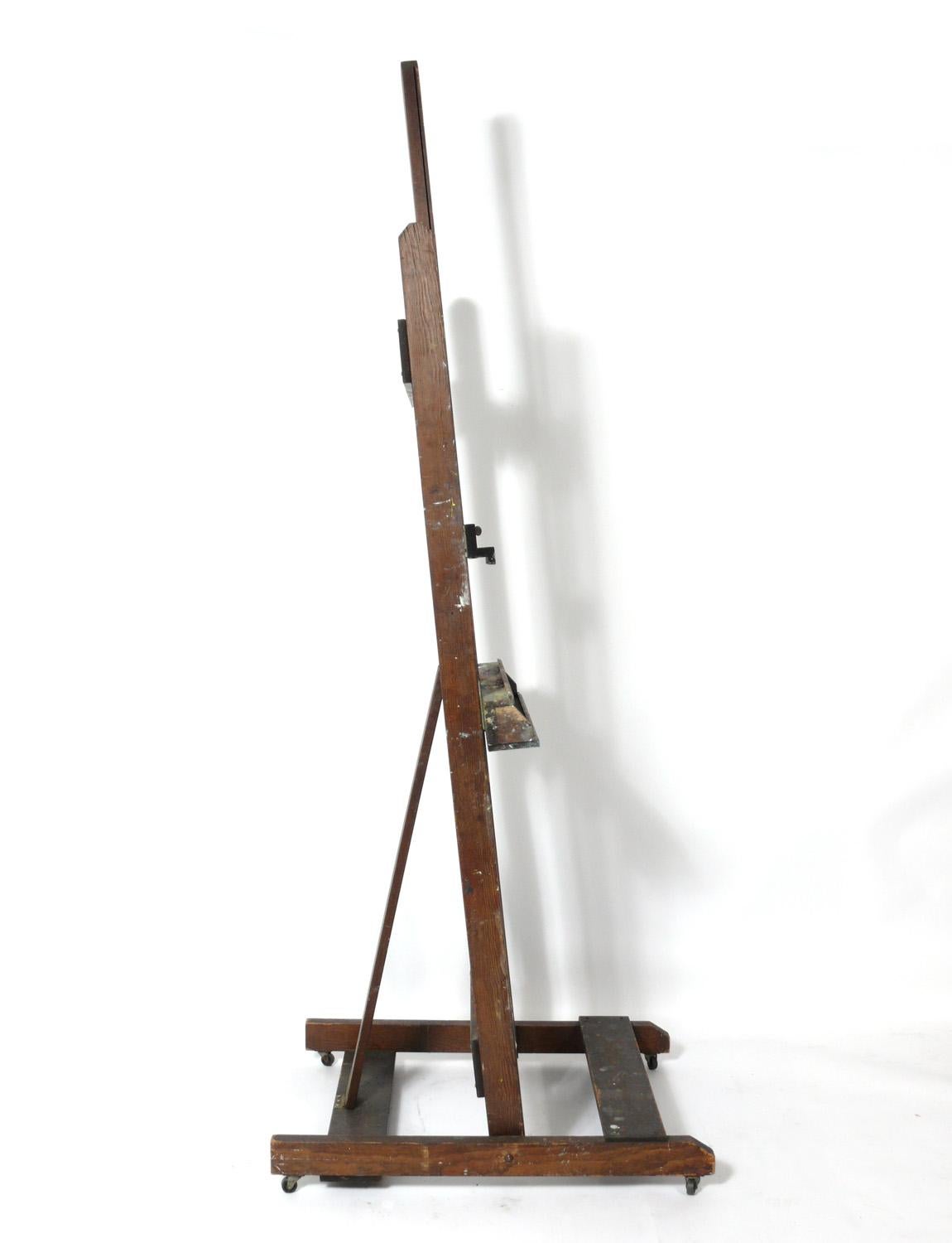 Vintage artist's easel by Anco Bilt, American, circa 1950s. This easel is a versatile piece and can be used for its intended purpose, as an easel, or to display a work of art, or hold a flat screen television. The easel retains its wonderful