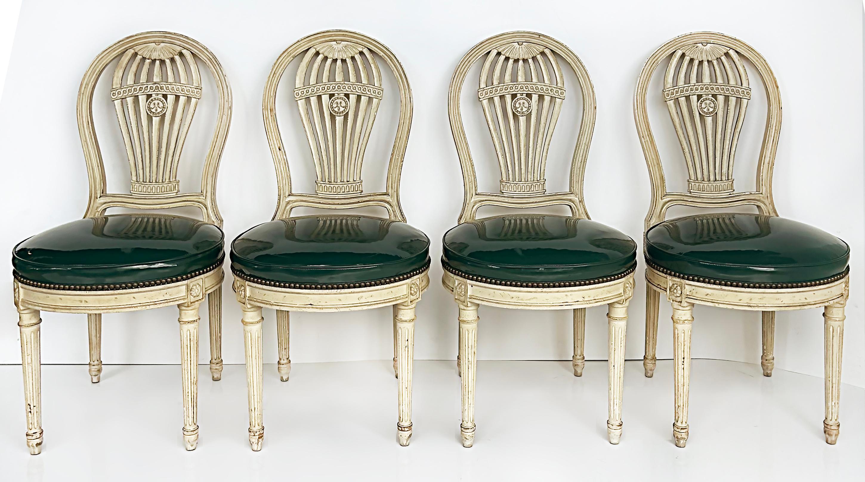 Vintage Painted Balloon back chairs, Maison Jansen Attributed, Patent Faux Seats

Offered for sale is a set of four (4) painted balloon back dining chairs with deep green faux patent leather Naugahyde upholstered seats. The chair seats have brass