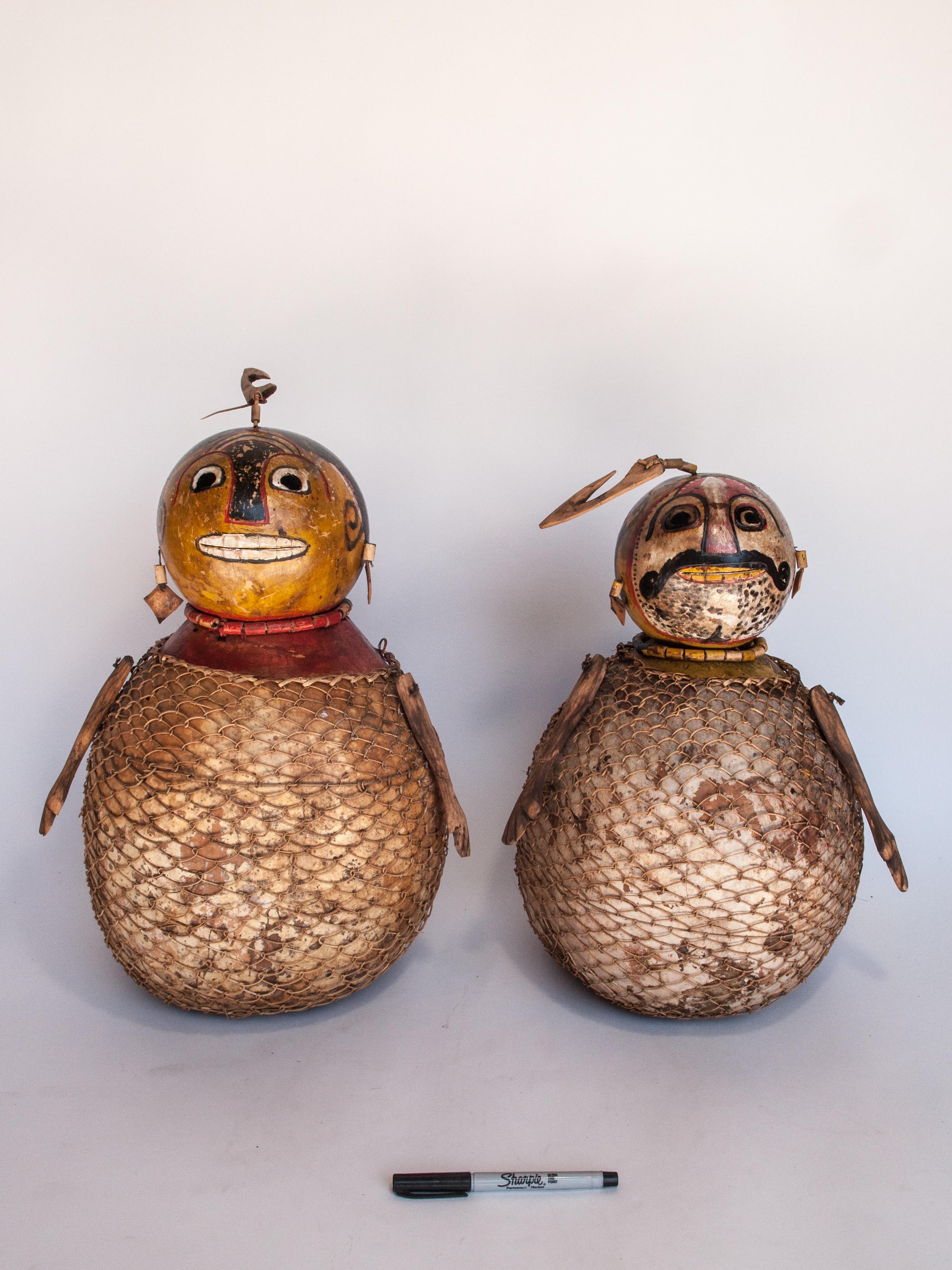 Vintage painted gourd couple. Folk Art from Lombok, Indonesia, late 20th century.
This delightful couple functioned as a kind of Lombok folk version of the Loro Blonyo Wedding Statues so important to Javanese culture. The female figure is Dewi Sri,