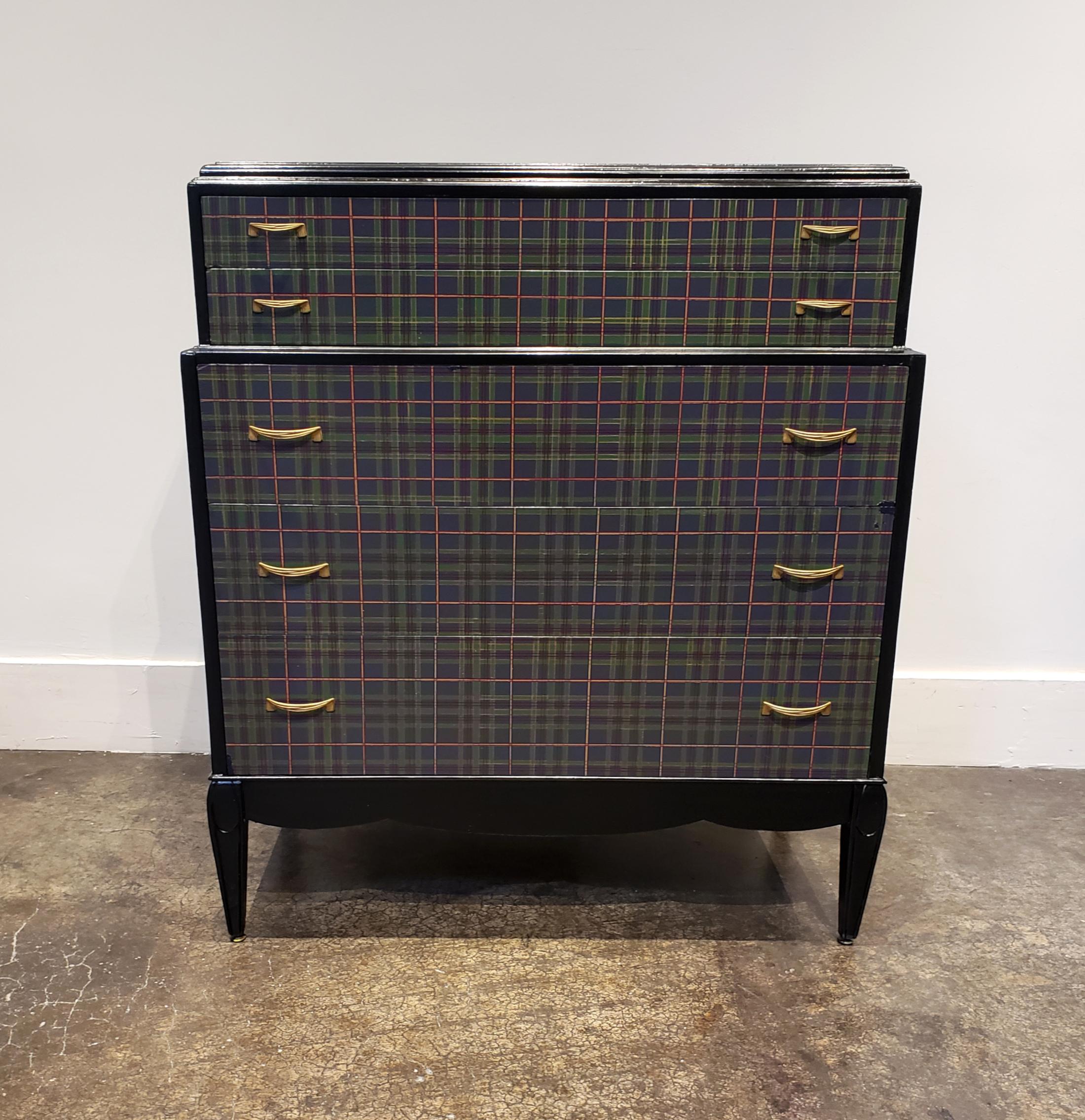 Unique shabby-chic painted chest in glossy black with hand painted tartan print on drawers. Two smaller drawers on top with three large pullout / pull-out drawers on bottom. All drawers have two ribbon style brass pulls.