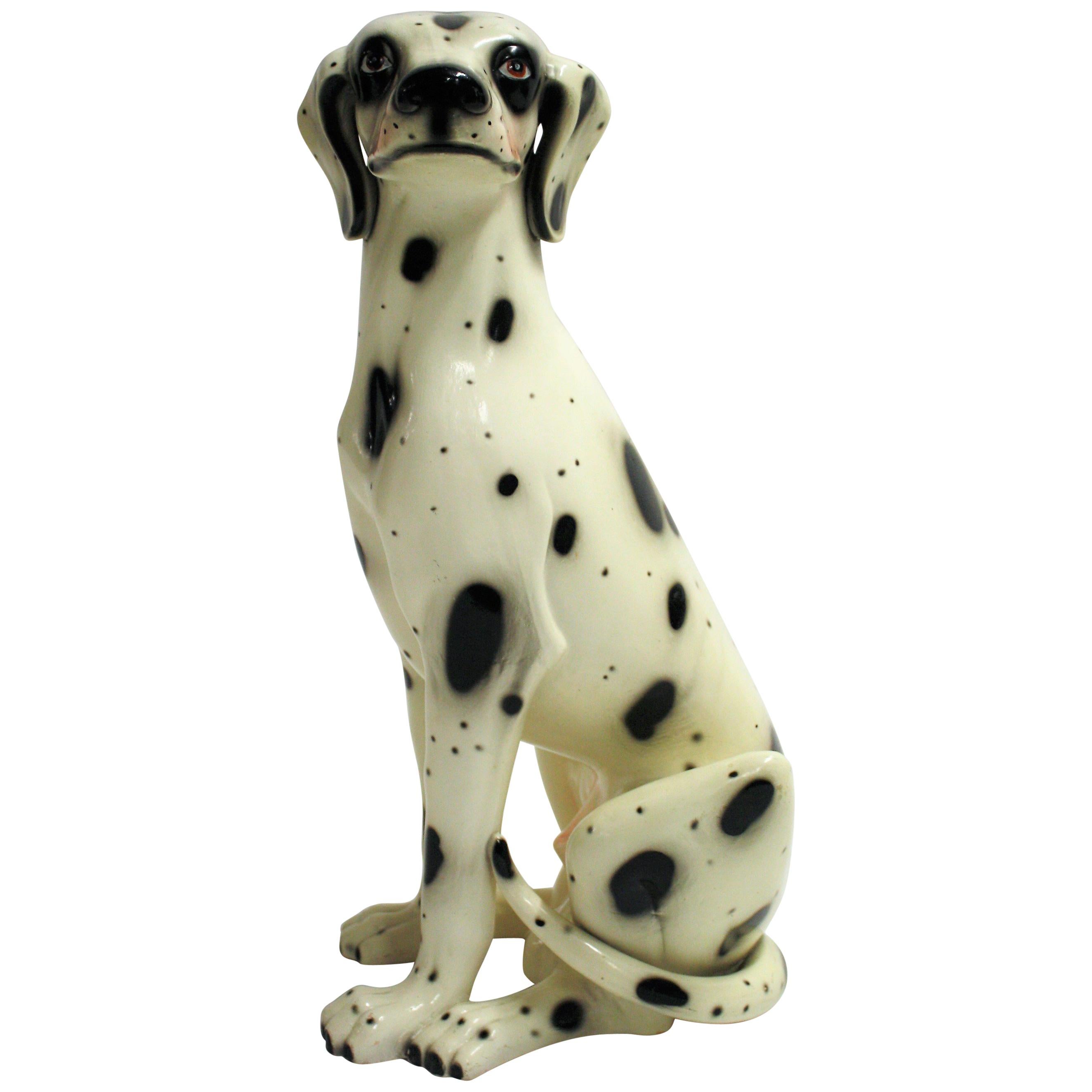 Large hand painted ceramic sculpture of a dalmatian dog made from terracotta with a matching pupy sized one.

Marked 'made in italy' at the bottom.

Very good condition, no chips or damages.

1960s - Italy

Dimensions large dog:
Height: