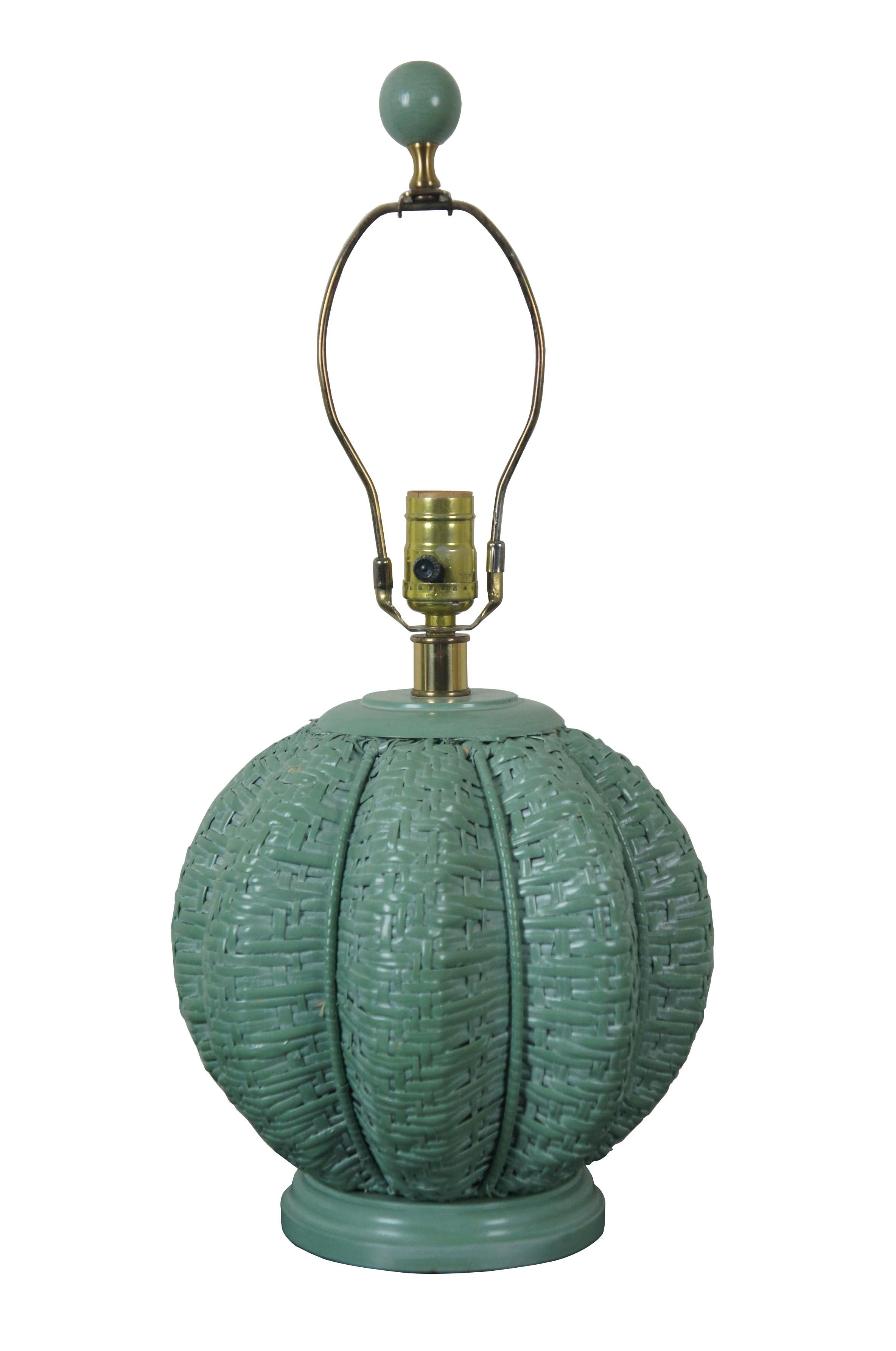 Vintage painted wicker rattan boho chic green urn shaped table lamp and shade

Green painted wicker pumpkin shaped table lamp and shade.

Measures: 10.5” x 13.75”, finial height 2”, shade 18” x 9.5” (Diameter x Height.)