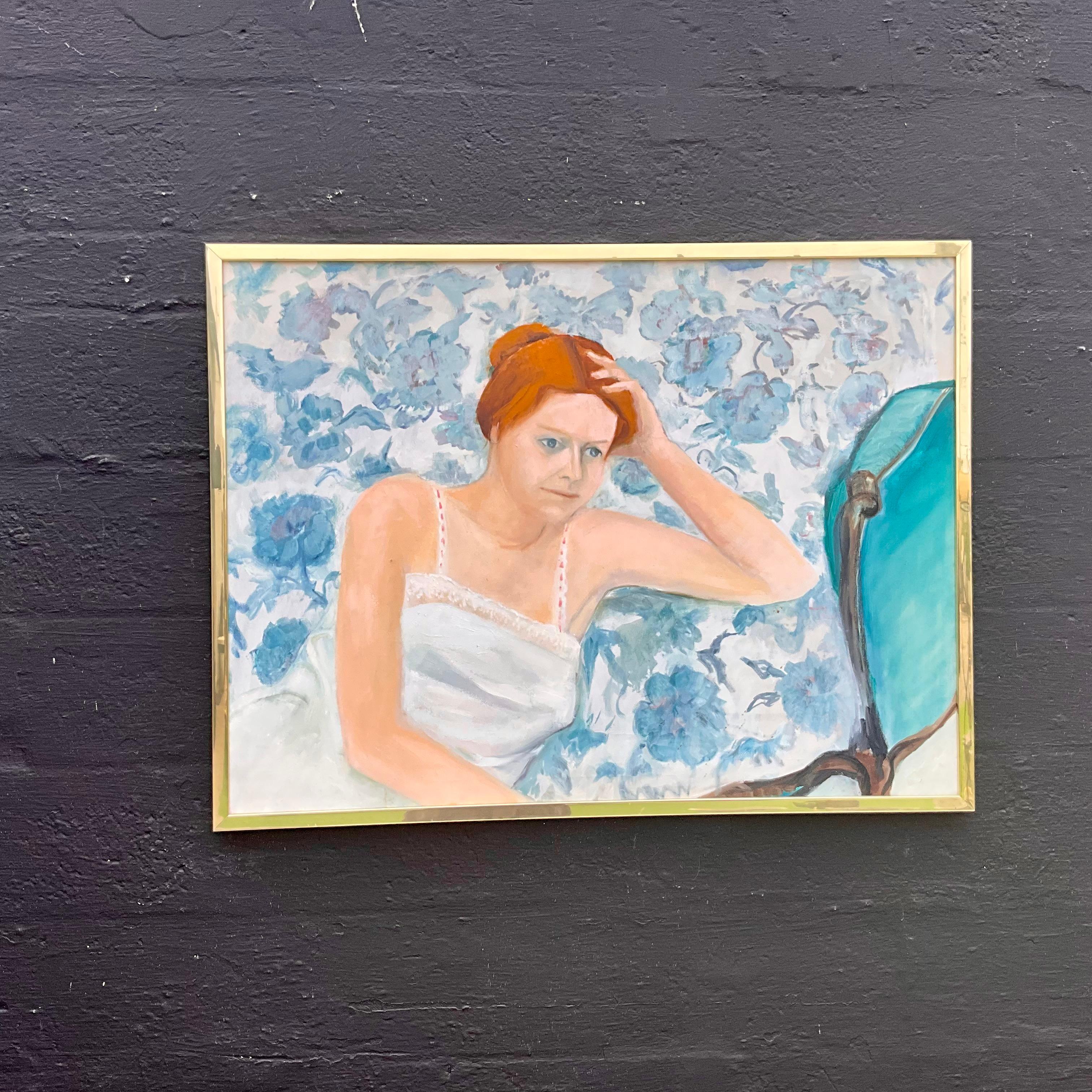 **Title:** Contemplation in Blue

**Description:** This vintage acrylic on canvas painting by E.M. Kaufman captures a moment of introspection, featuring a woman with striking red hair seated against a backdrop of soft blue floral patterns. The