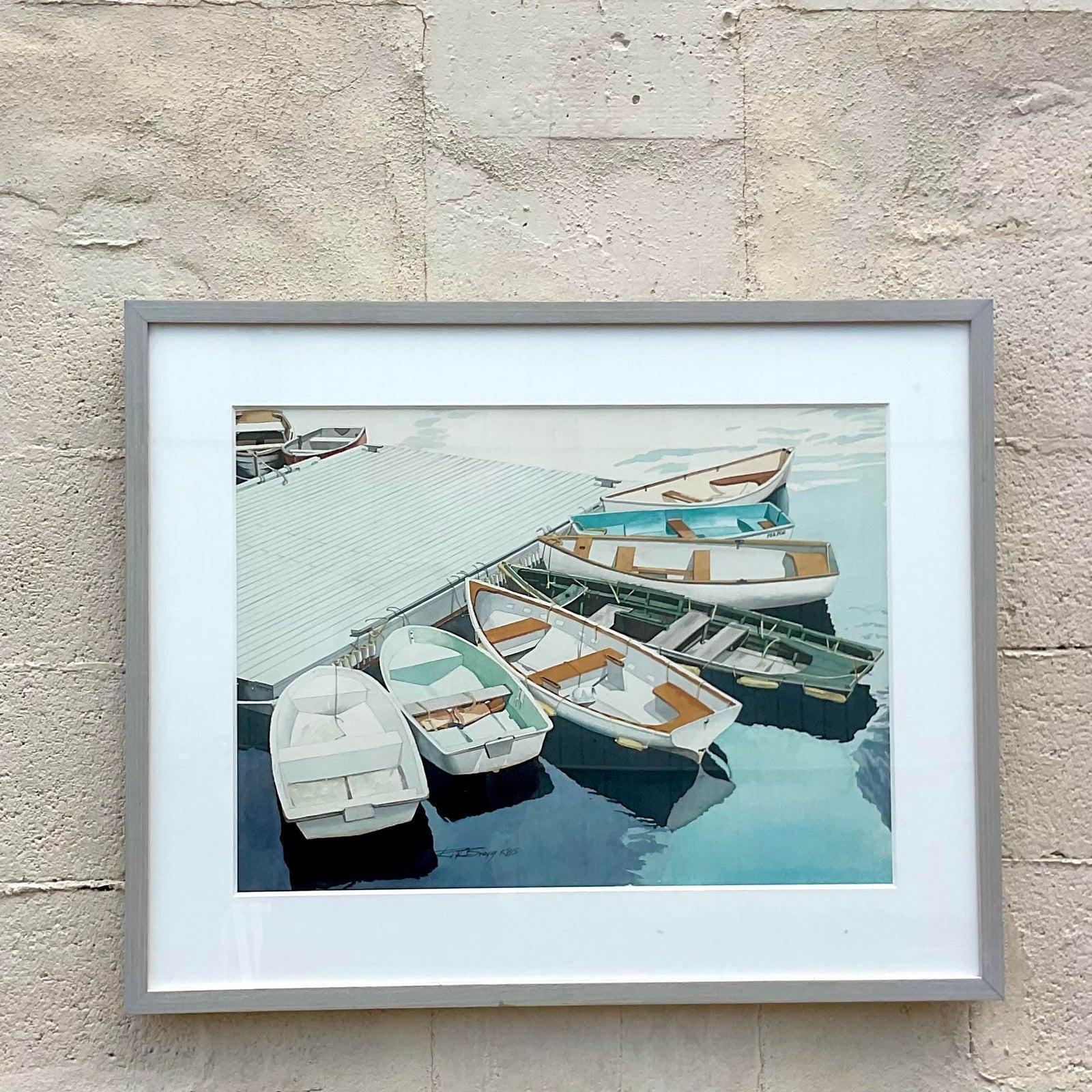 A fantastic vintage watercolor painting framed of dinghy’s tied up at a dock by artist Robert W. Bragg. Acquired at a Palm Beach estate.