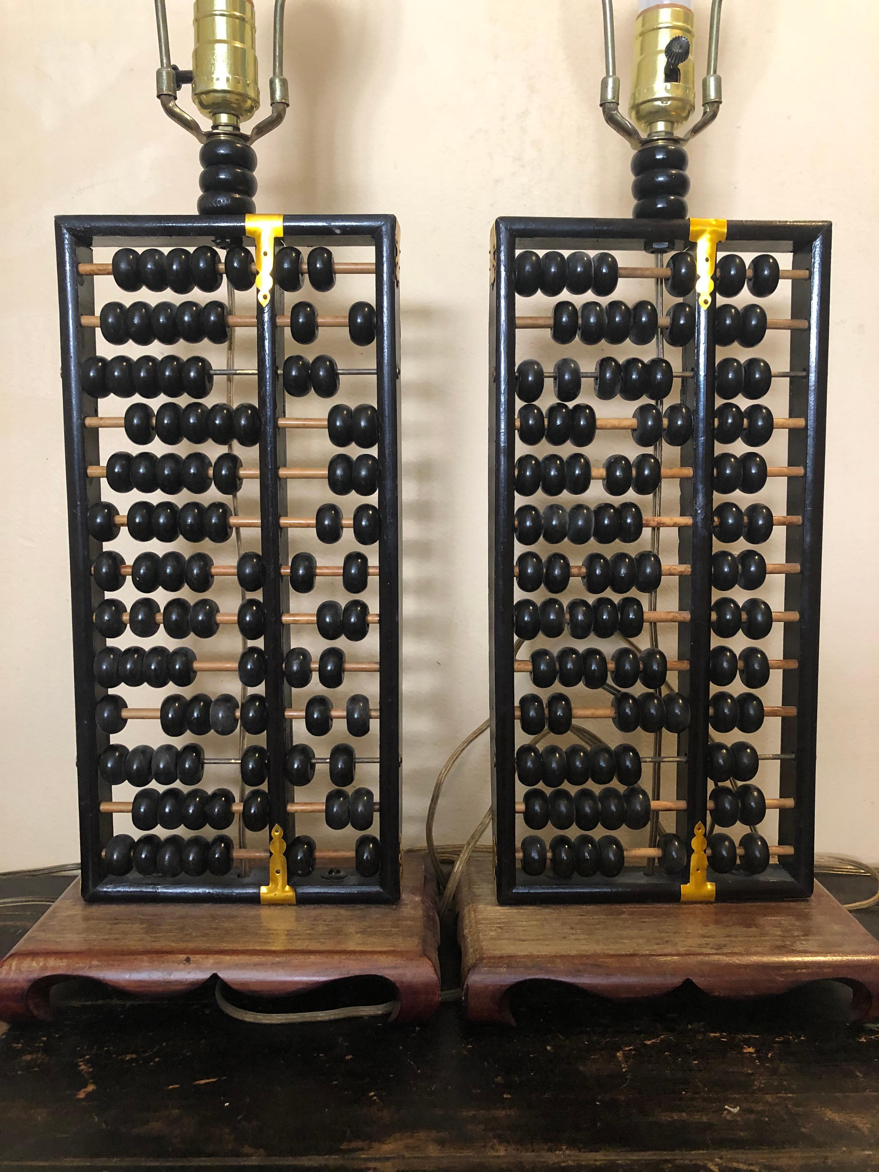Wonderful pair of mid century Chinese Abacus Lamps made in Honk Kong.