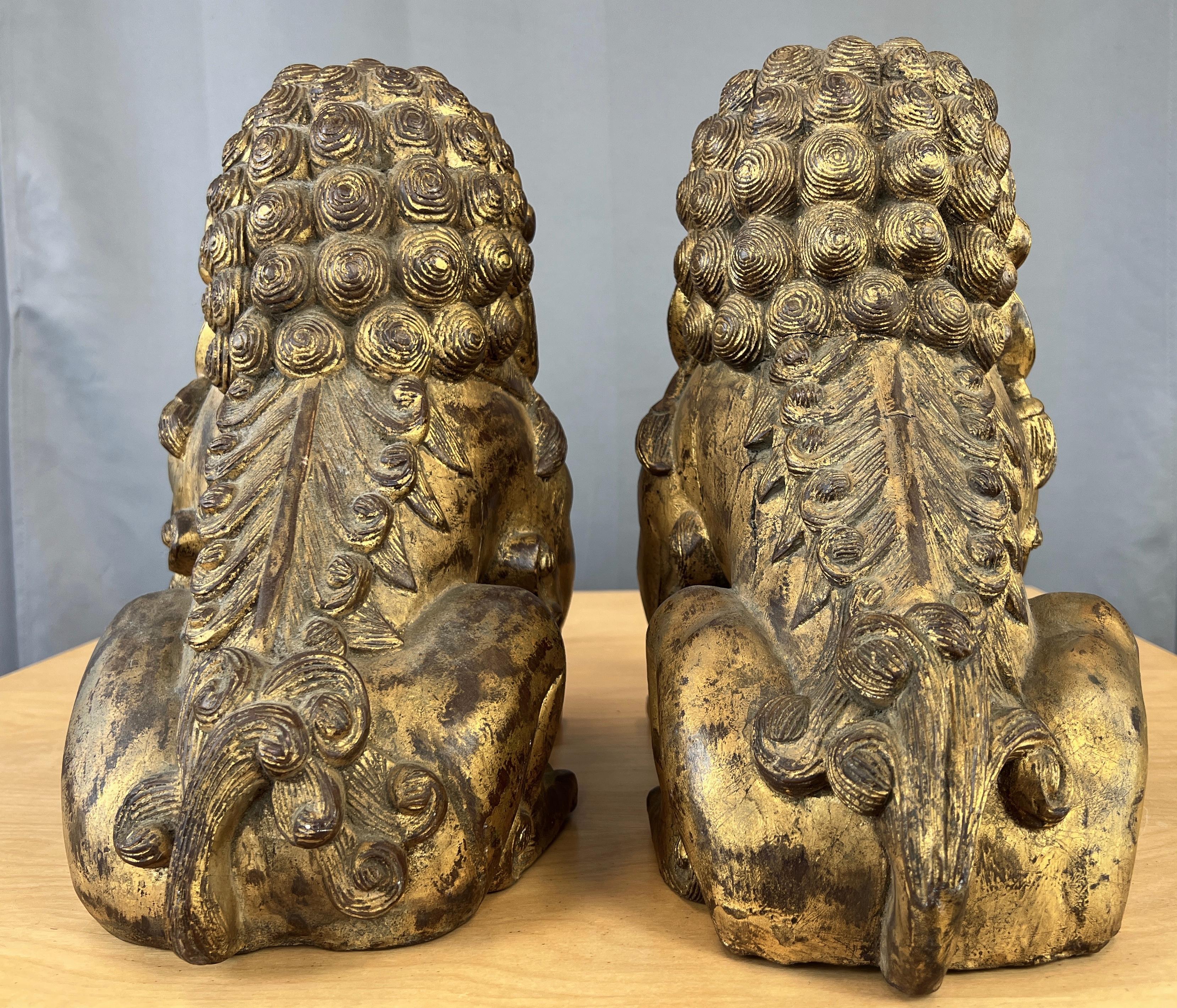 Vintage Pair Chinese Gilt Carved Wood Foo Dog / Guardian Lions Figurines In Good Condition For Sale In San Francisco, CA