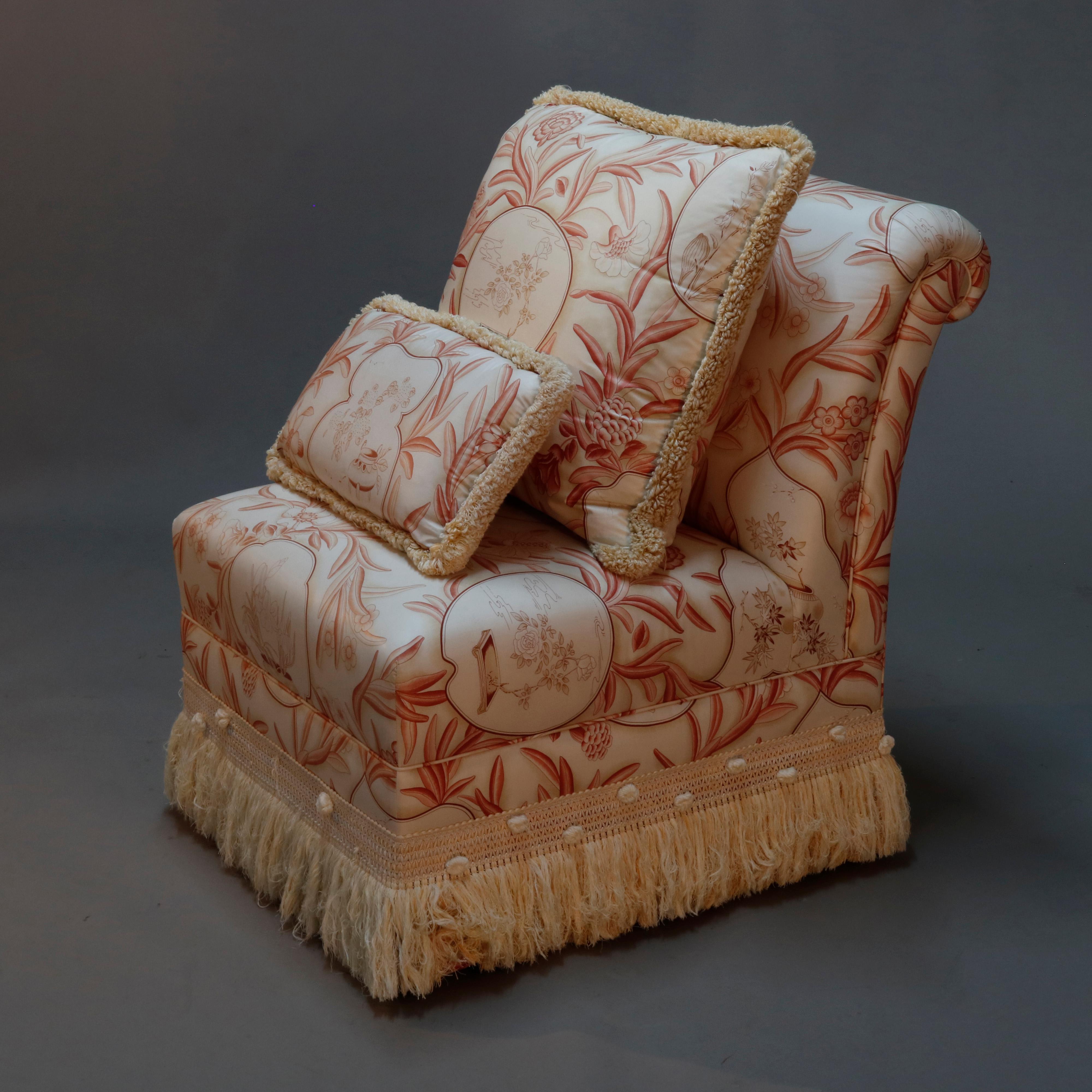 A vintage set of boudoir slipper chairs by Piedmont are upholstered in chinoiserie designed fabric with scrolled backs surmounting fringed bases, four matching pillows, 20th century

Measures: 34.25