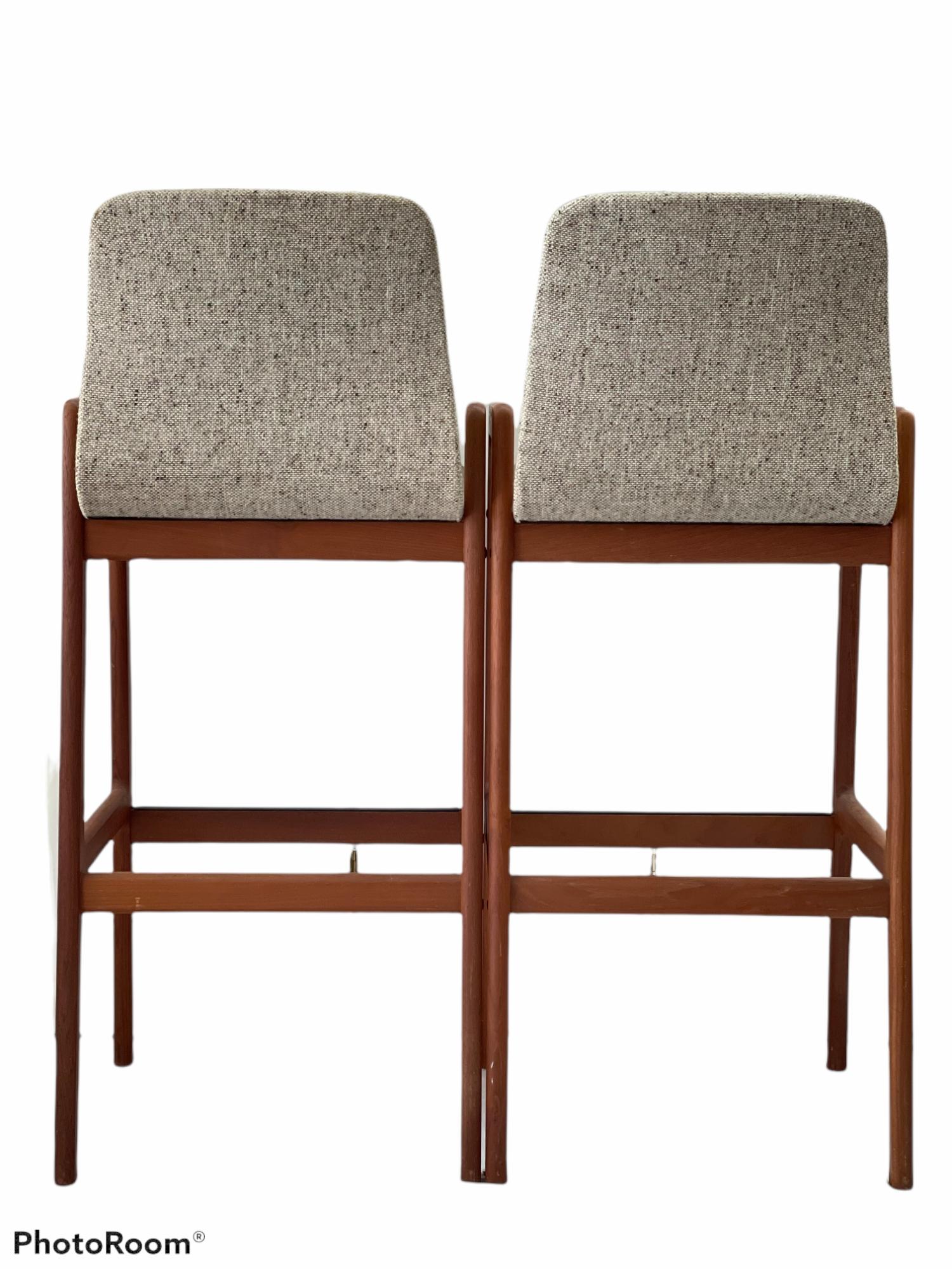 For sale we have a pair of danish modern teak barstools made in Denmark. They are in good condition overall. They don't have any tears or stains.