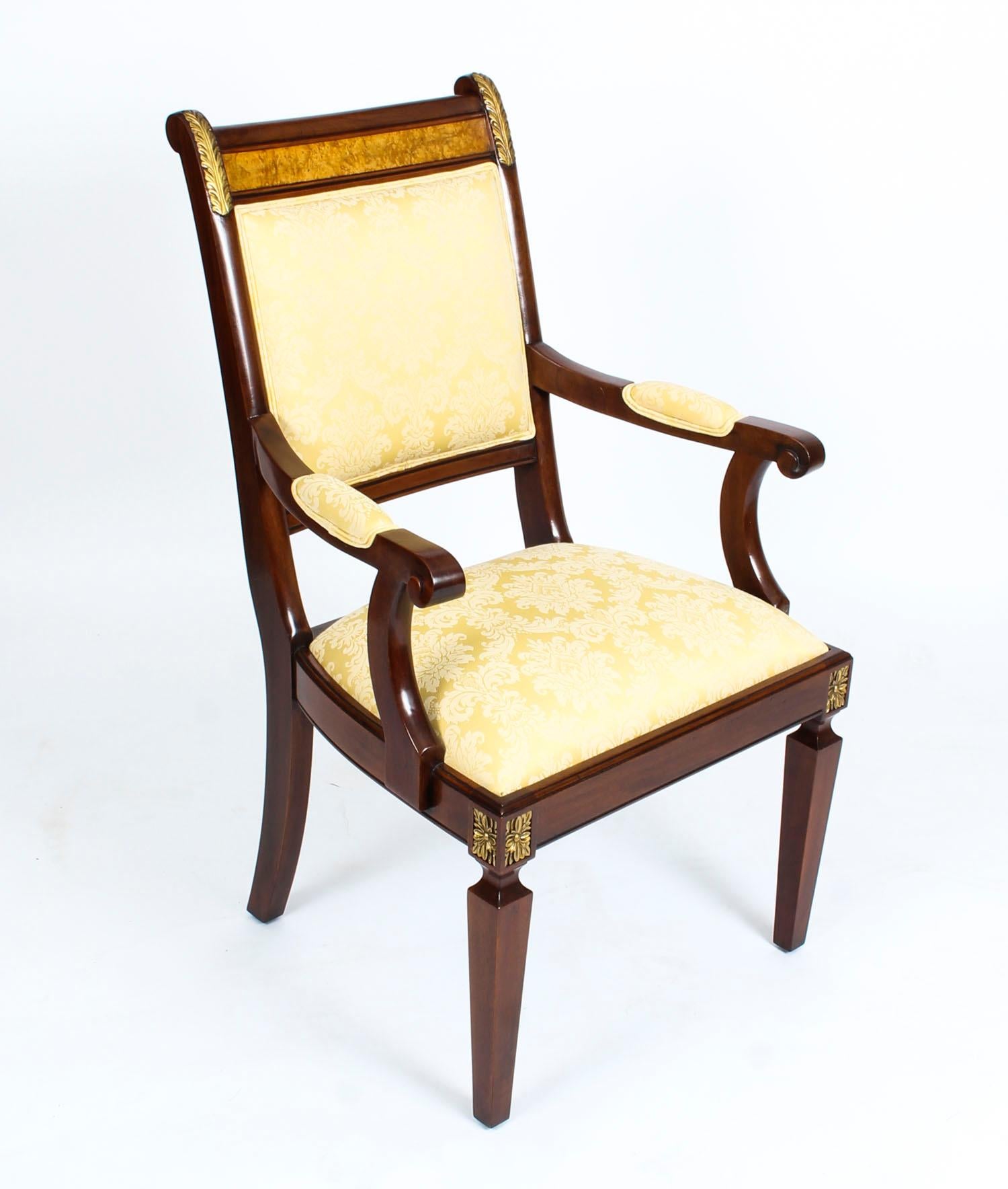 This is a beautiful pair of Empire Revival mahogany armchairs by the renowned cabinet maker, Charles Barr and dating from the late 20th century. 

The mahogany is a beautiful rich colour and has been embellished with striking ormolu mounts and