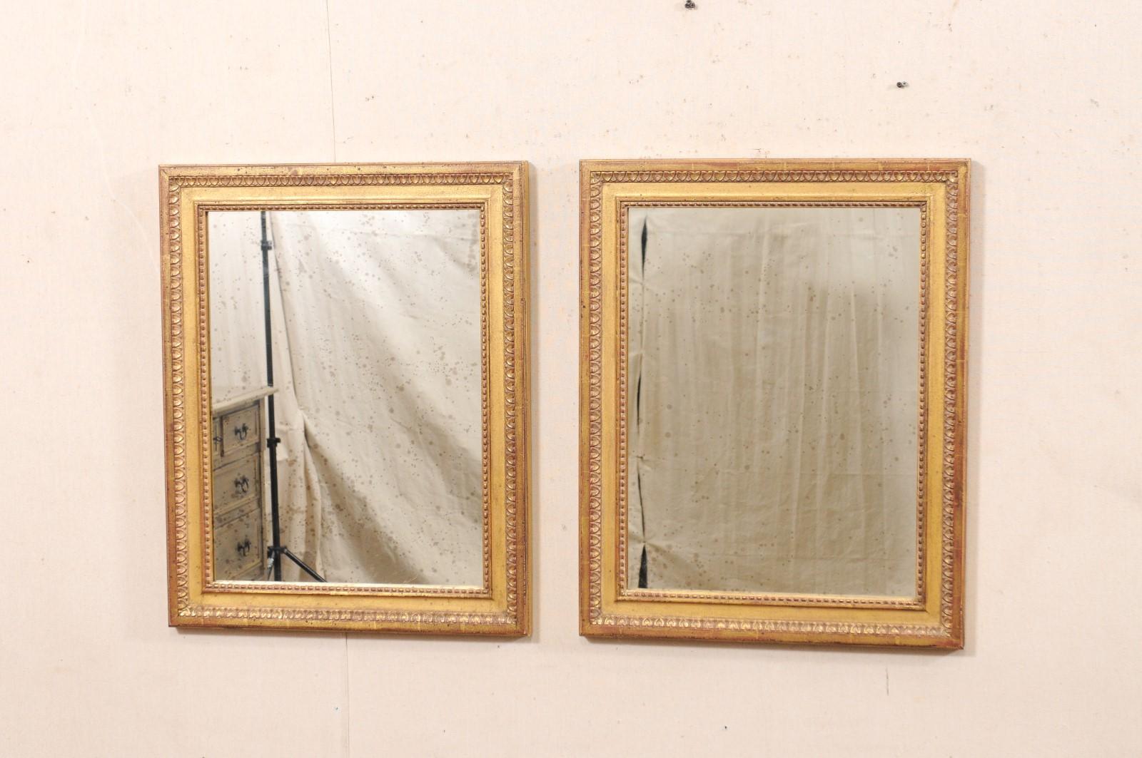 Américain Paire de miroirs d'appoint dorés avec bordure en ébène, 2 pieds de large x 2,5 pieds de haut en vente