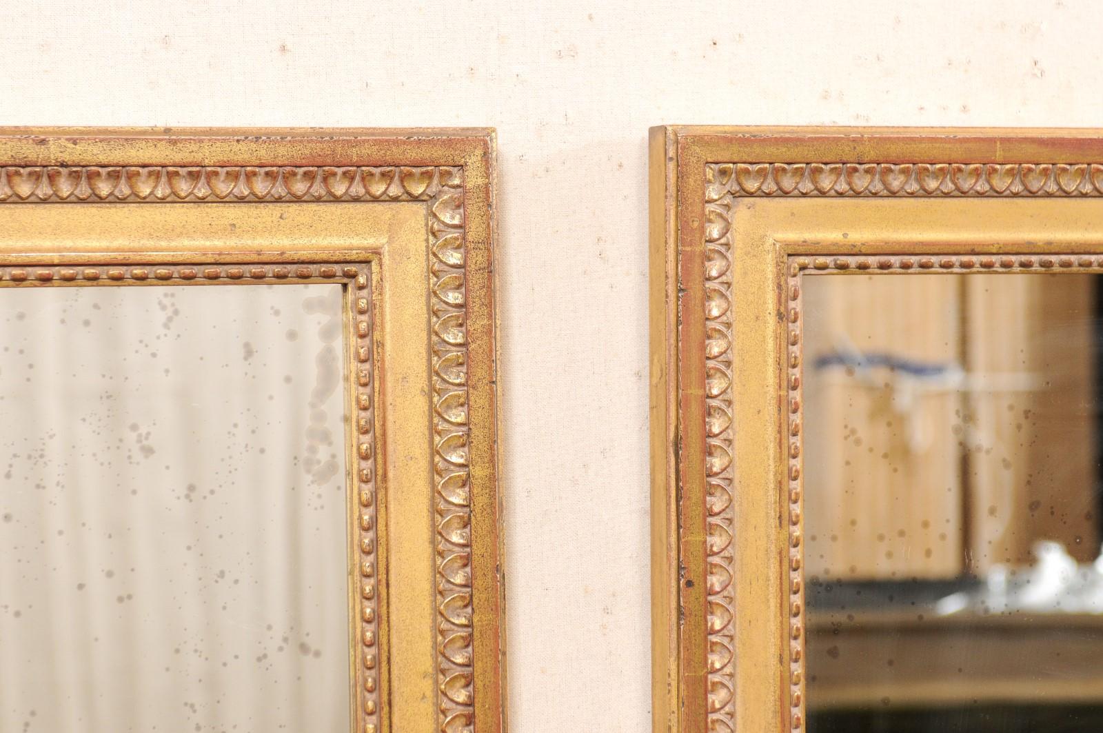 Paire de miroirs d'appoint dorés avec bordure en ébène, 2 pieds de large x 2,5 pieds de haut en vente 1