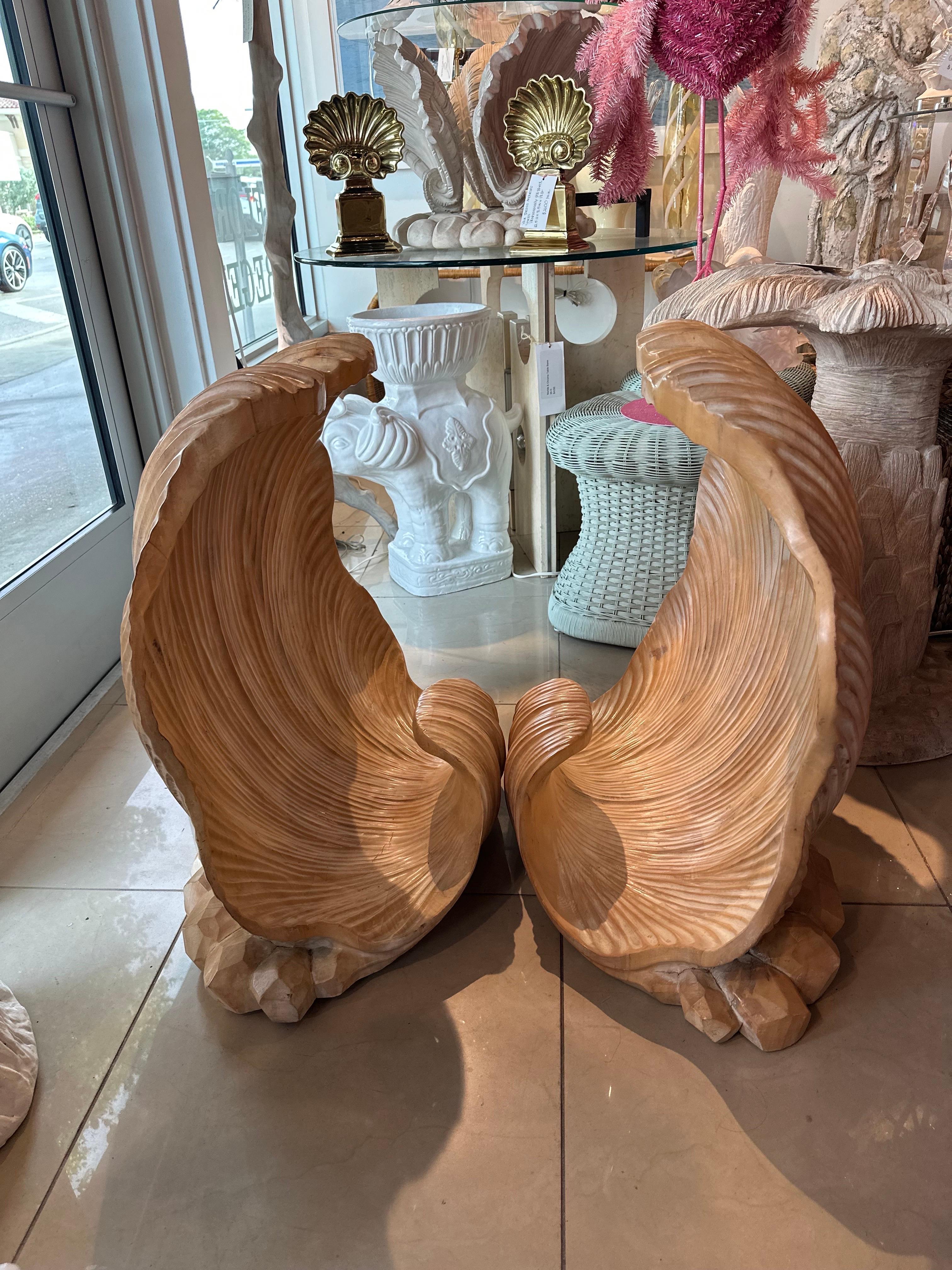 Lovely pair of vintage Palm Beach grotto carved wood dining table or console table bases. Scalloped clam seashell shell. Dimensions are 28 H x 28 W x 16 D.