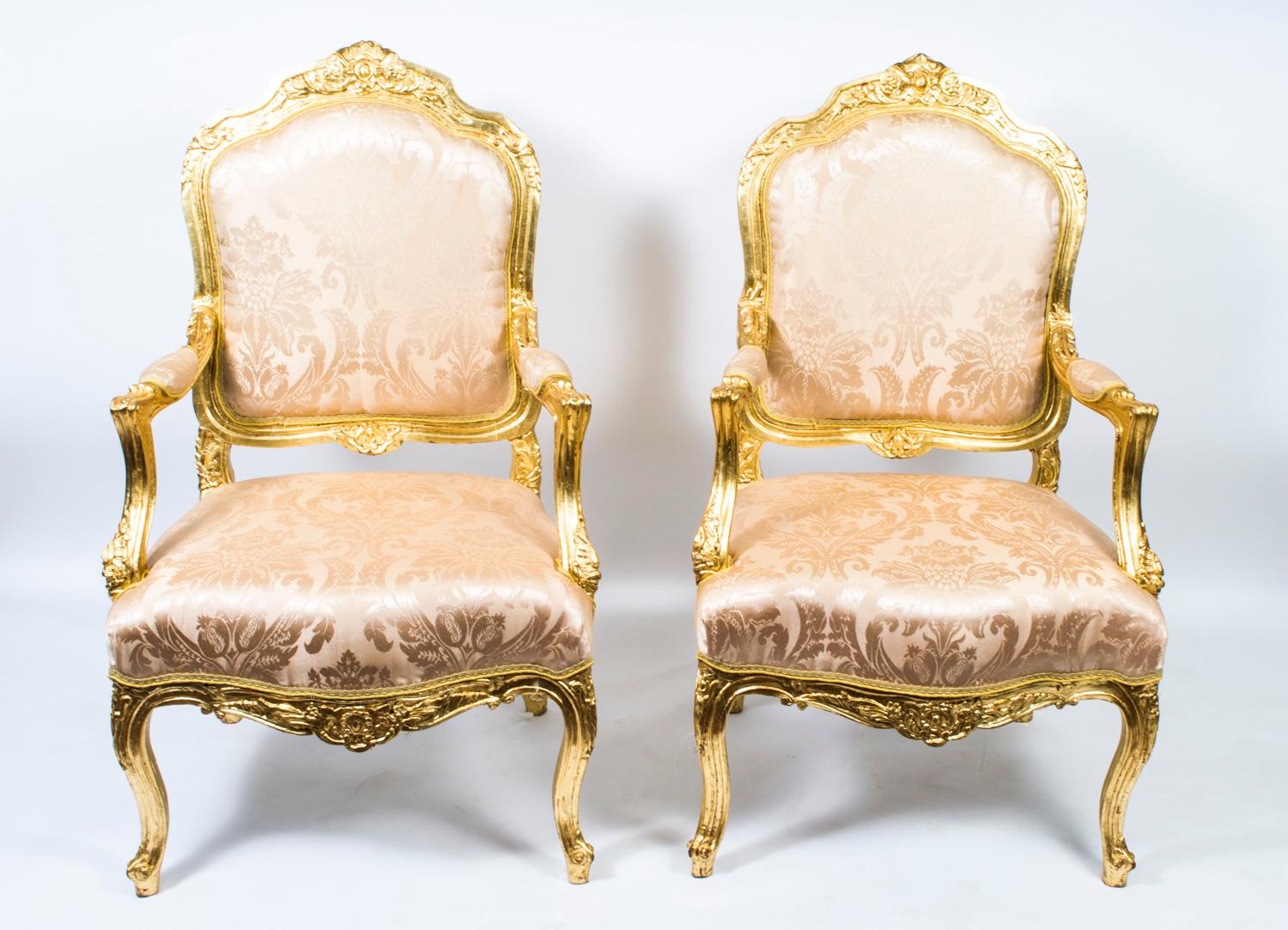 This is a stunning pair of French carved giltwood armchairs in the Louis XV style from the last quarter of the 20th century. 

The chairs feature hand-carved decoration and have been reupholstered in a gorgeous patterned fabric.

Add a touch of