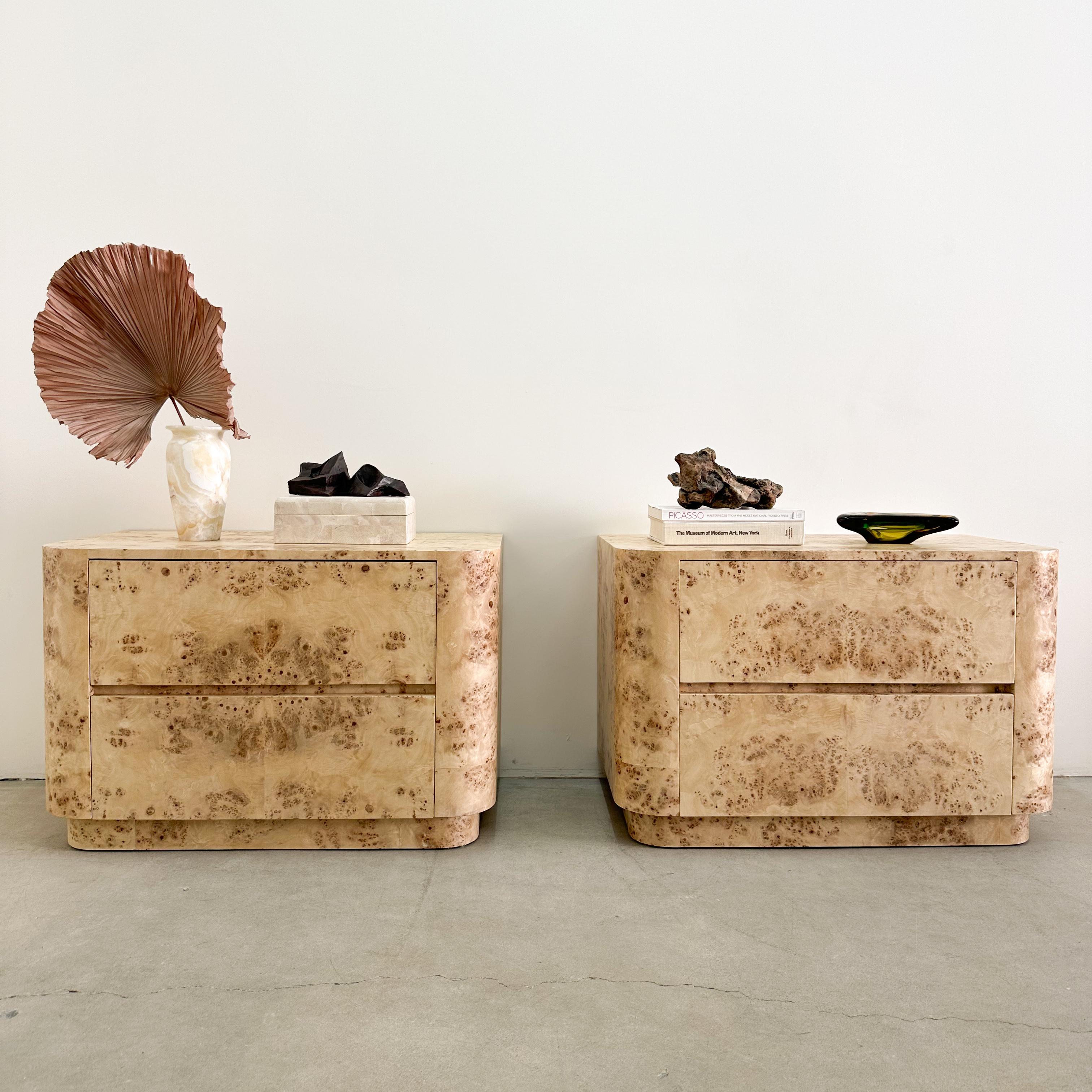 The vintage nightstands have been re-veneered with mappa burlwood and sealed with a satin finish for enhanced durability.

Color: Light to medium. 

Condition: The drawers are clean and move nicely.
Restored beautifully and in exceptional vintage
