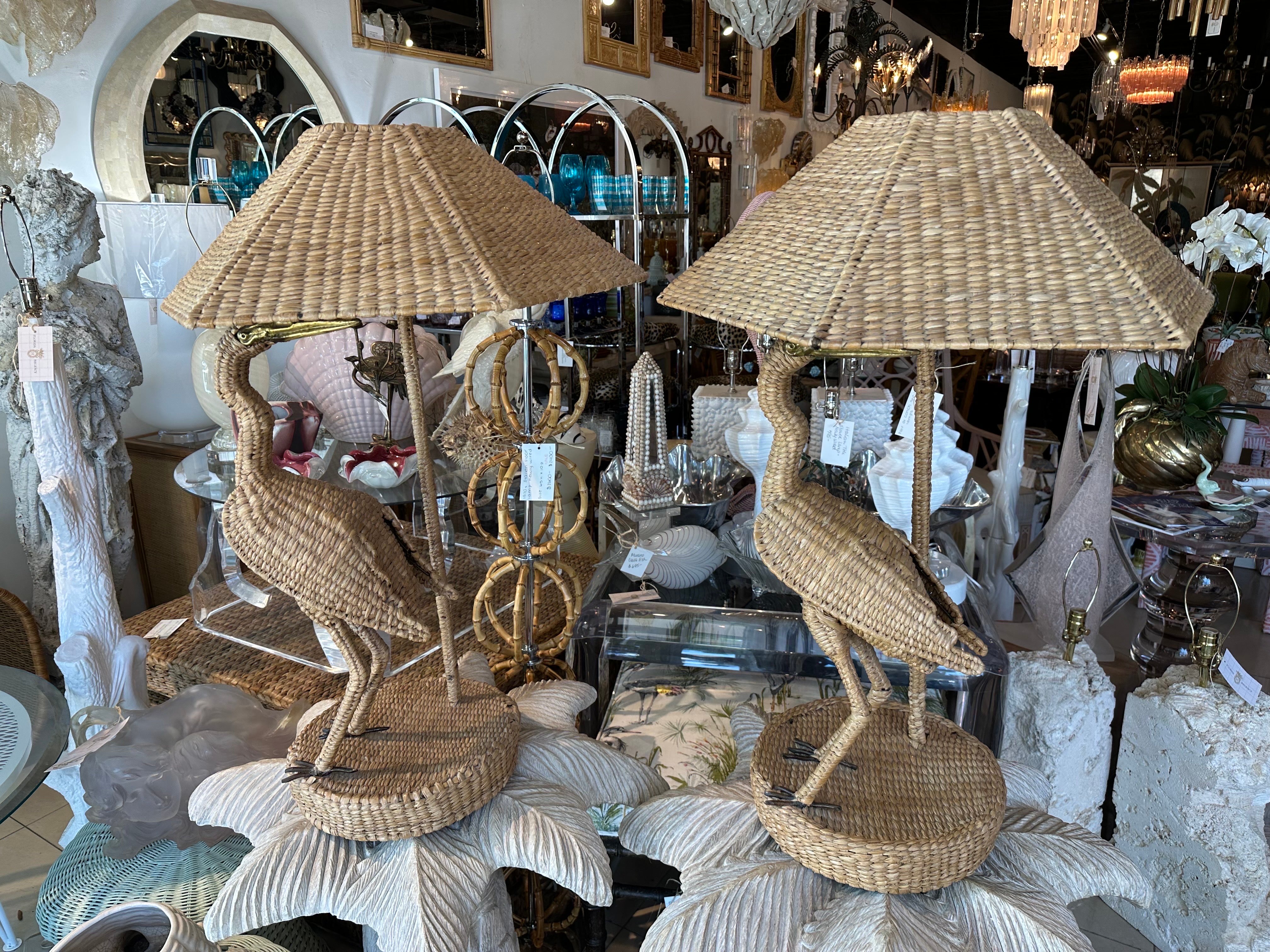 Beautiful vintage 1970s Mario Lopez Torres (marked underneath on both lamps) Heron bird table lamps. Woven rattan and brass accents. May have slight variations as these were handmade. No visible damage or defects. Original wiring, tested. Dimensions