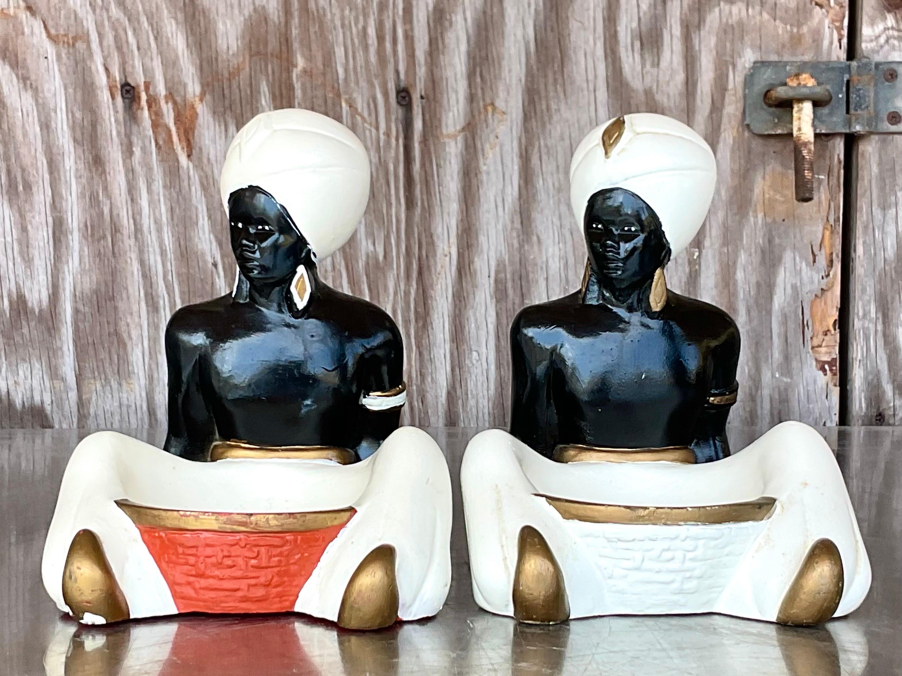 A beautiful pair of white and orange figurines that add a pop of color to any room. Acquired at a Palm Beach estate.